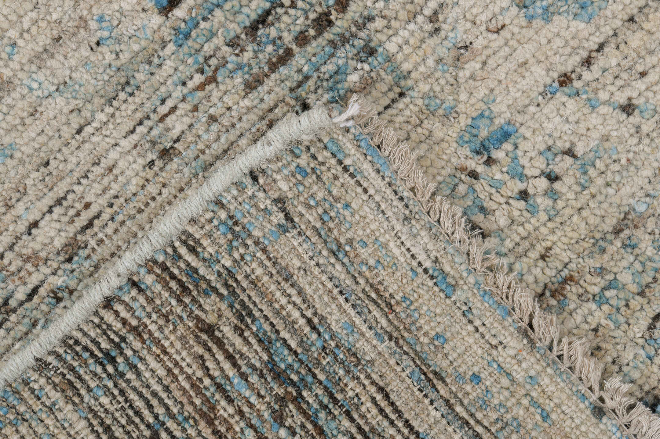 2' x 8' one-of-a-kind handmade vintage Tulu runner rug. Color palette: ivory, pale blue, sky blue, taupe, gray, light blue