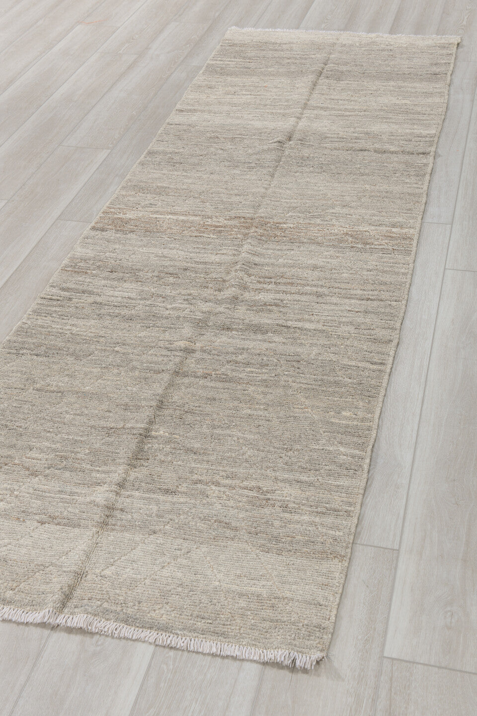 3' x 9' one-of-a-kind handmade vintage Tulu runner rug. Color palette: taupe, ivory, gray, cream, charcoal, beige, black