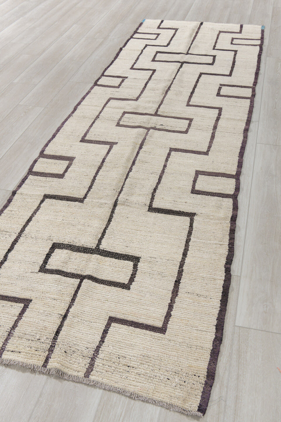 3' x 11' one-of-a-kind handmade vintage Tulu runner rug. Color palette: ivory, brown, charcoal, sky_blue, gray, black