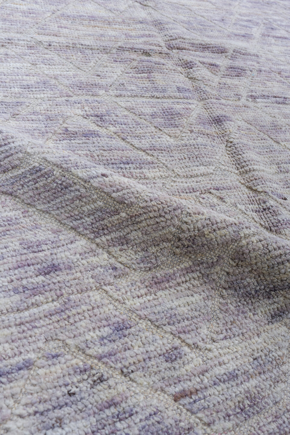 3' x 11' one-of-a-kind handmade vintage Tulu runner rug. Color palette: ivory, taupe, lavender, gray, greige, beige