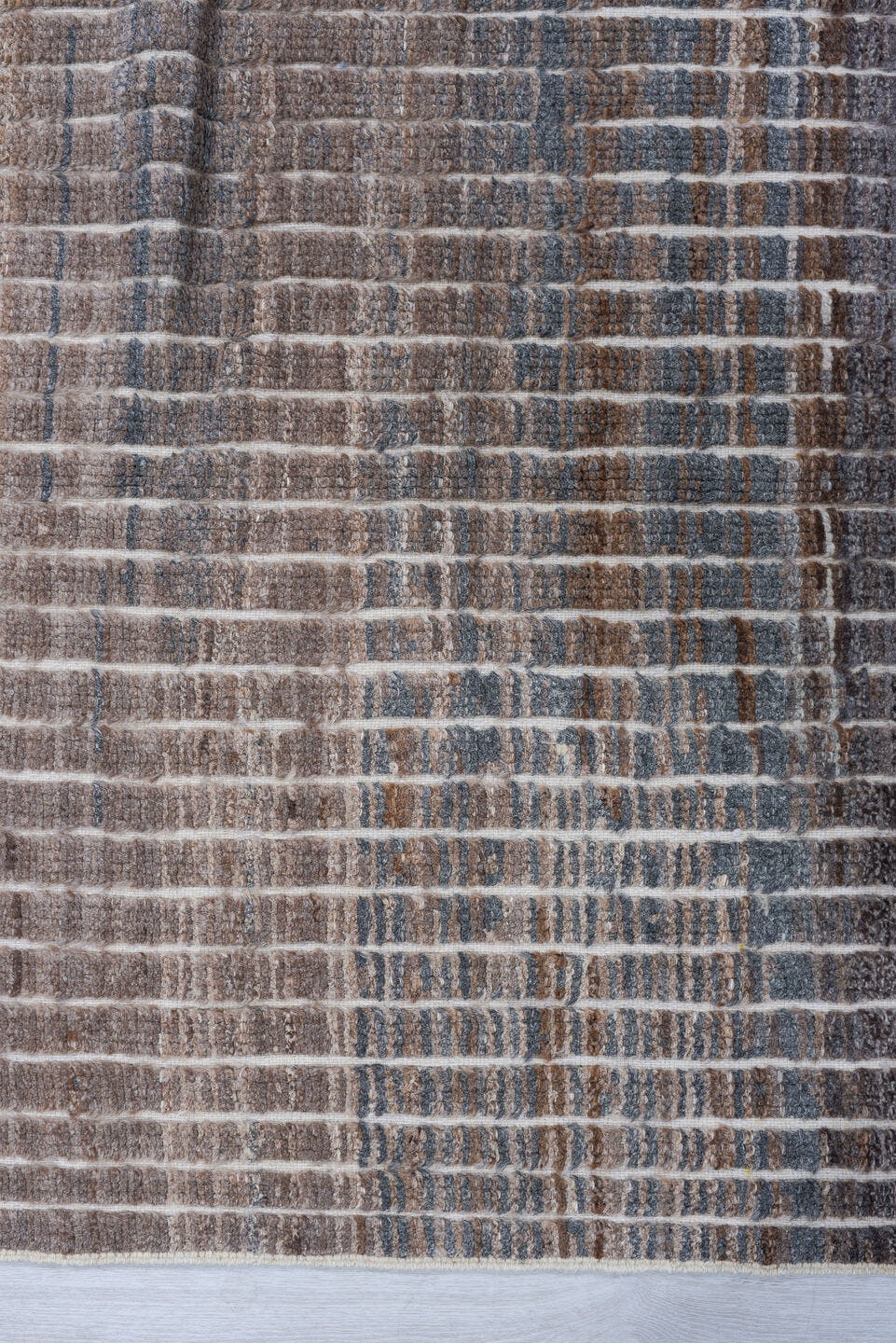 3' x 9' one-of-a-kind handmade vintage Tulu runner rug. Color palette: taupe, charcoal, ivory, slate, brown, gray, beige