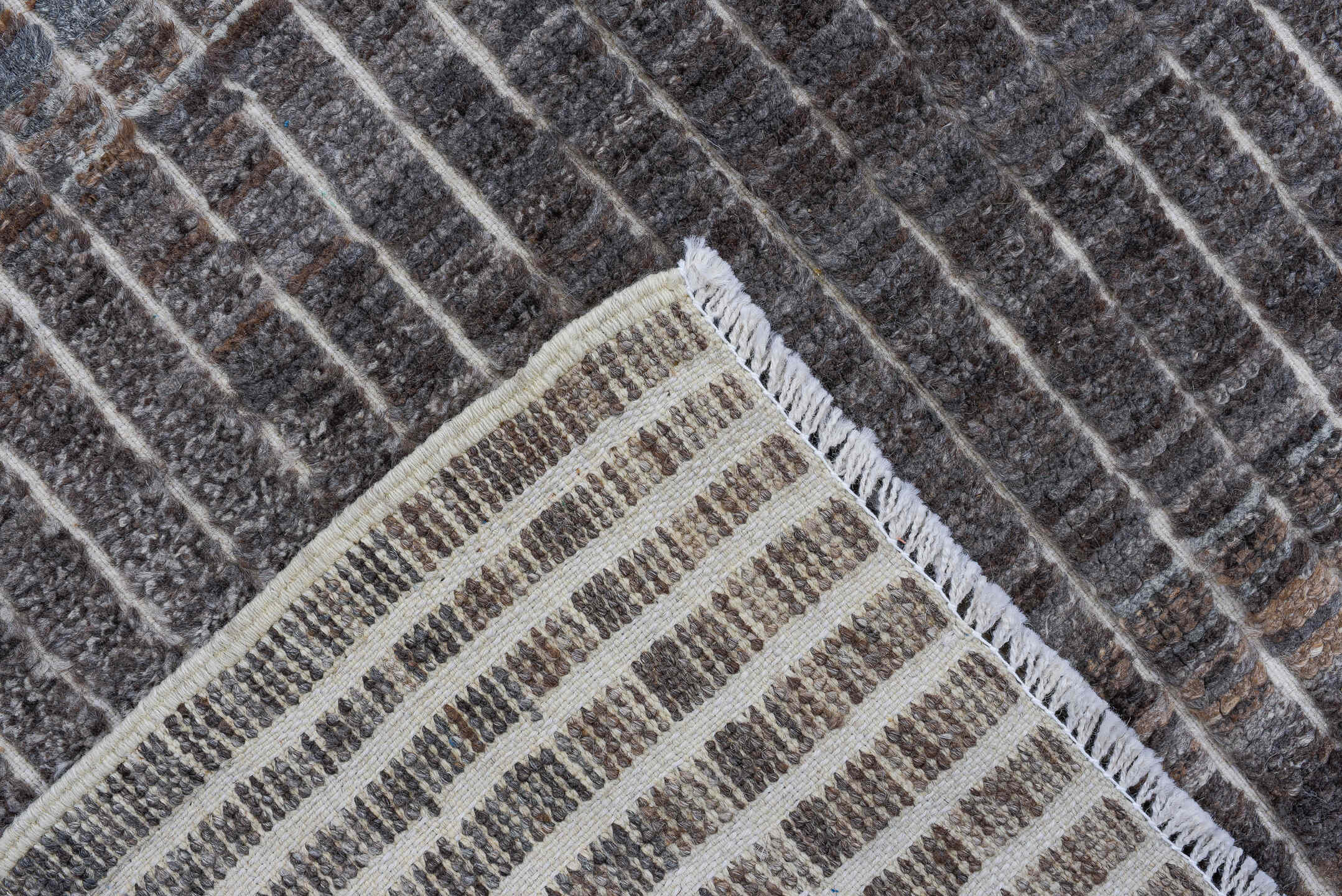 3' x 9' one-of-a-kind handmade vintage Tulu runner rug. Color palette: taupe, charcoal, ivory, slate, brown, gray, beige