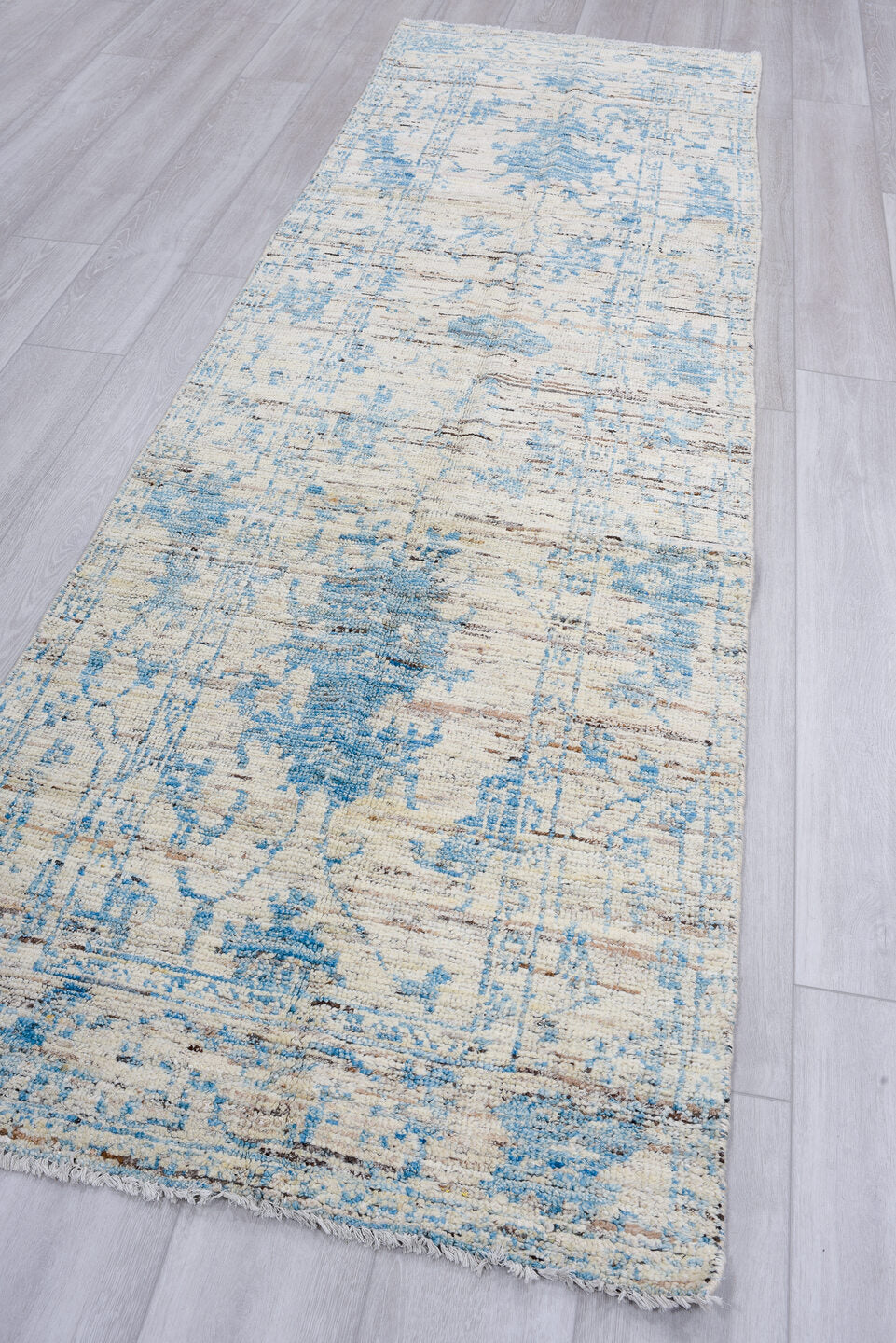 3' x 10' one-of-a-kind handmade vintage Tulu runner rug. Color palette: ivory, sky blue, charcoal, slate, cream, light blue