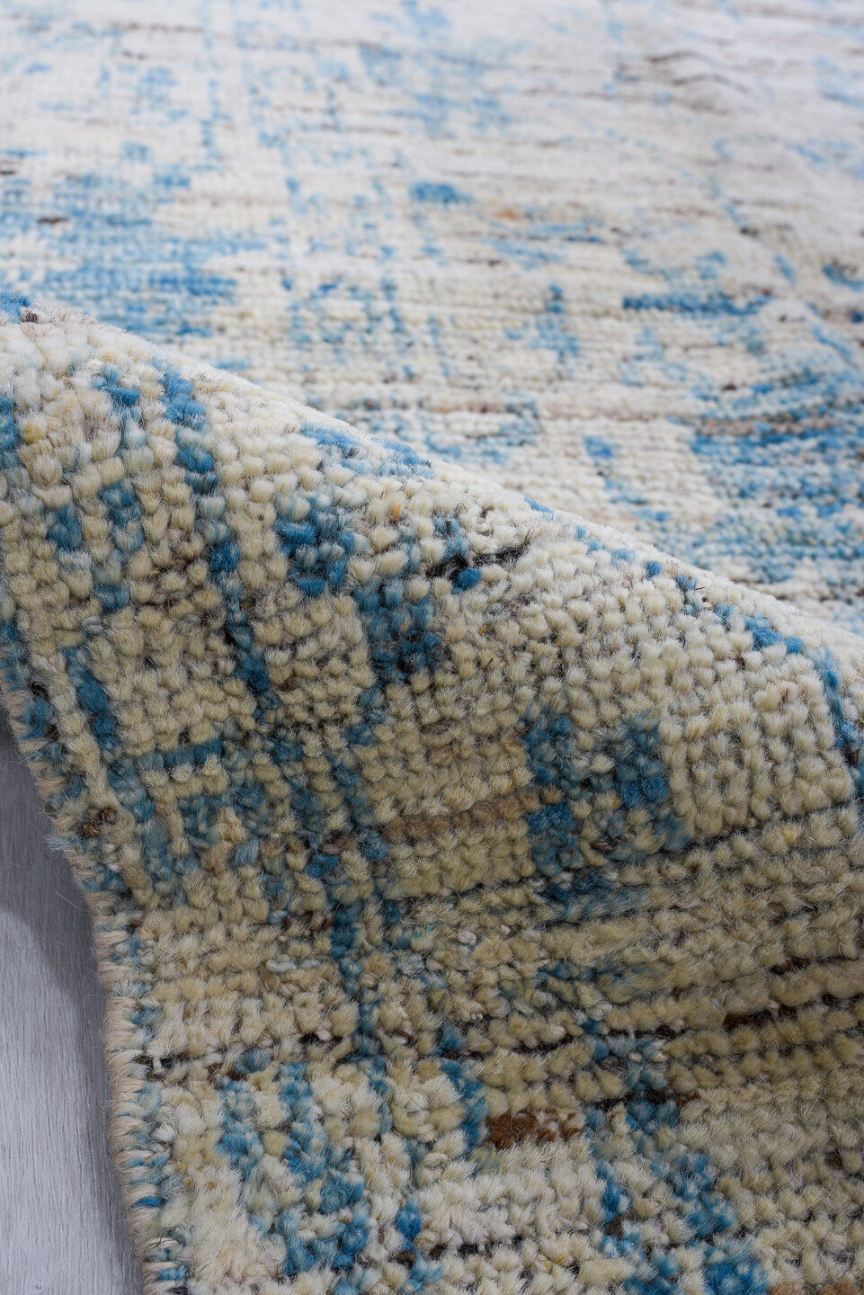 3' x 10' one-of-a-kind handmade vintage Tulu runner rug. Color palette: ivory, sky blue, charcoal, slate, cream, light blue