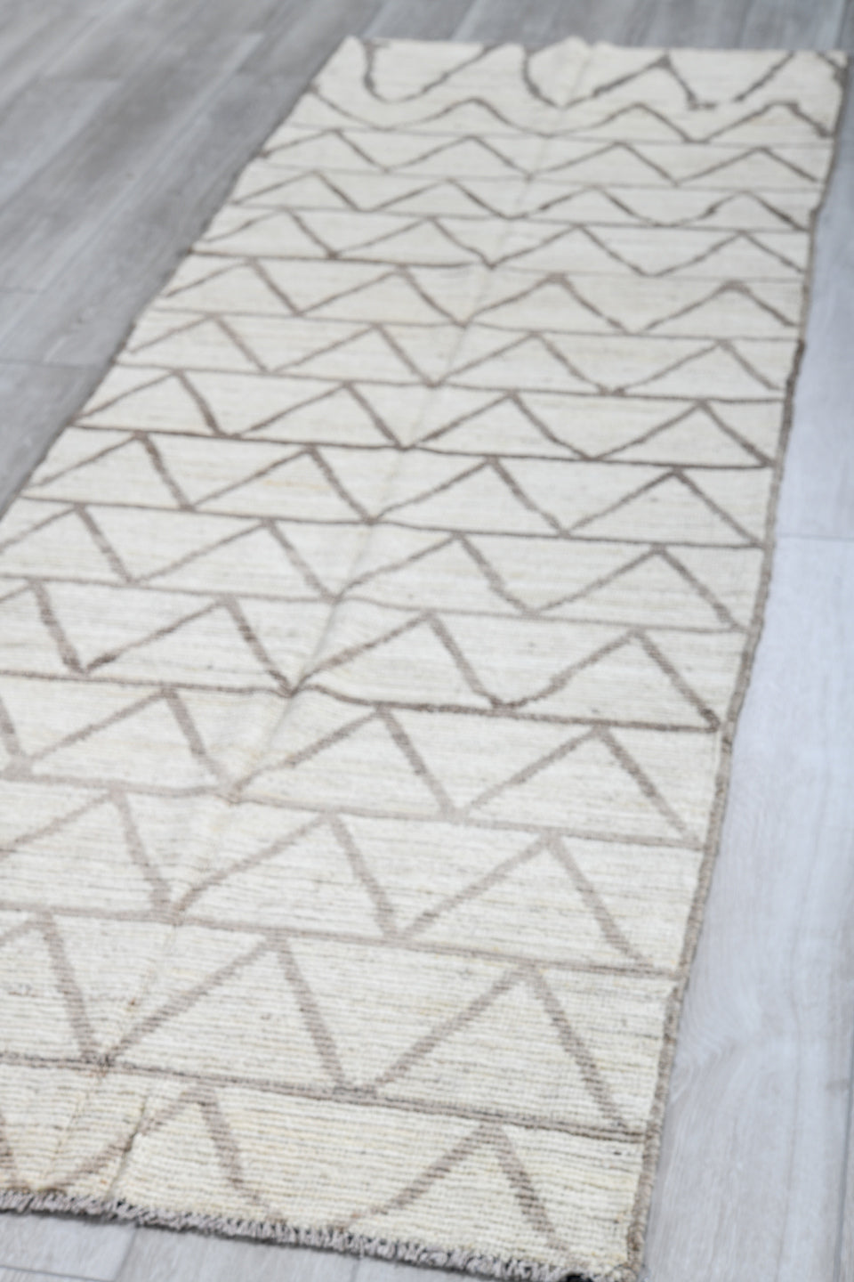 3' x 9' one-of-a-kind handmade vintage Tulu runner rug. Color palette: ivory, taupe, gray, beige