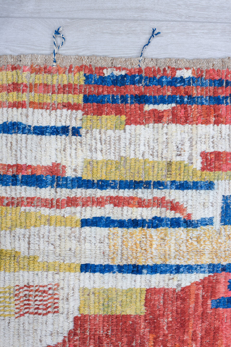 3' x 9' one-of-a-kind handmade vintage Tulu runner rug. Color palette: ivory, red, blue, gold, camel, beige