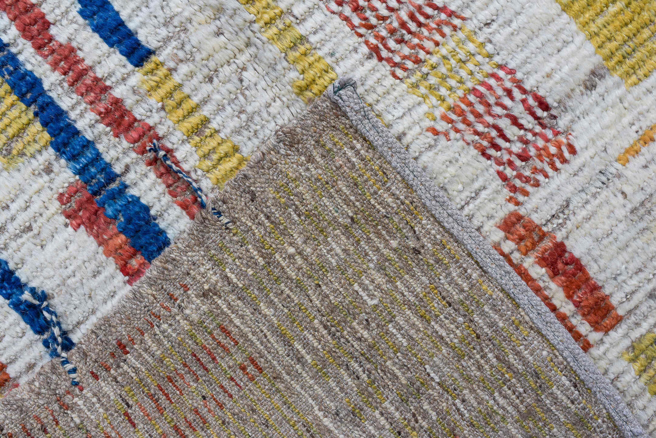 3' x 9' one-of-a-kind handmade vintage Tulu runner rug. Color palette: ivory, red, blue, gold, camel, beige