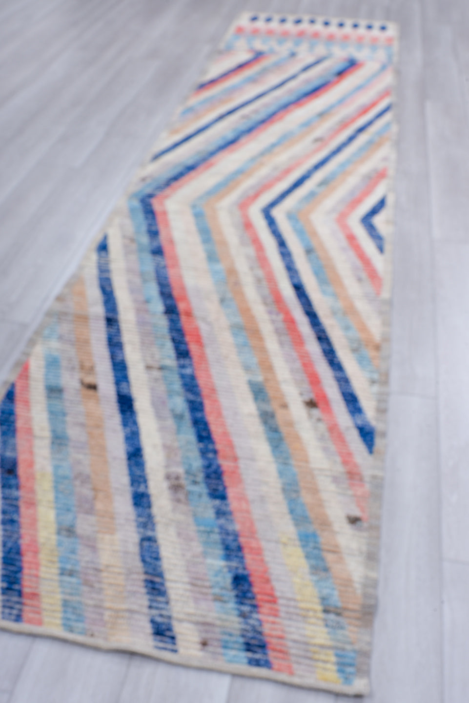 3' x 13' one-of-a-kind handmade vintage Tulu runner rug. Color palette: ivory, sky blue, navy, blush, sand, taupe