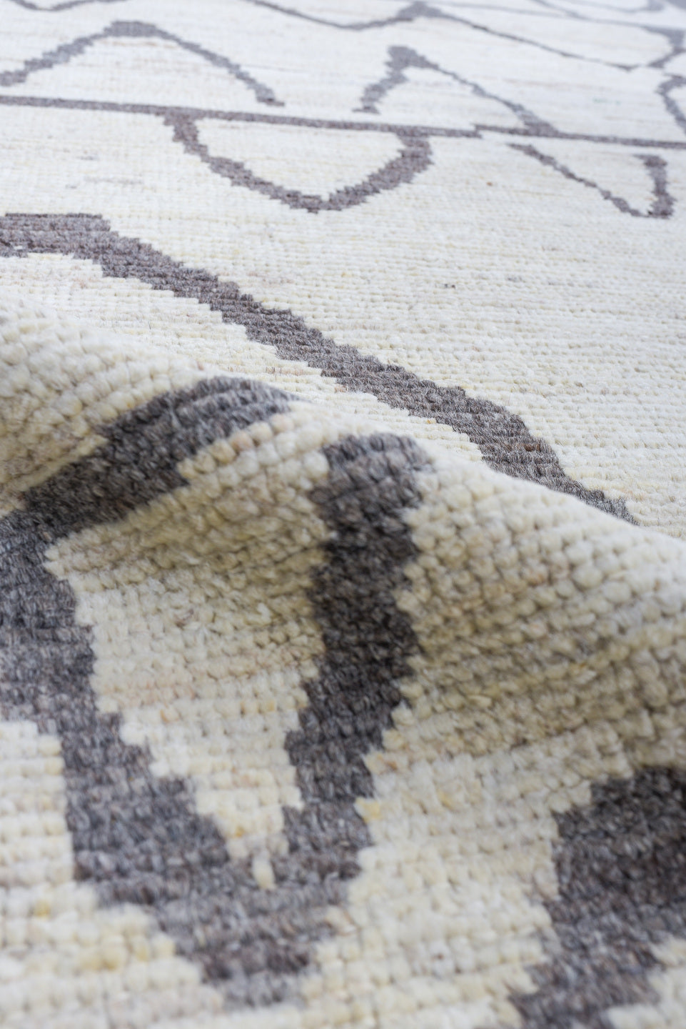 3' x 9' one-of-a-kind handmade vintage Tulu runner rug. Color palette: ivory, charcoal, gray, black