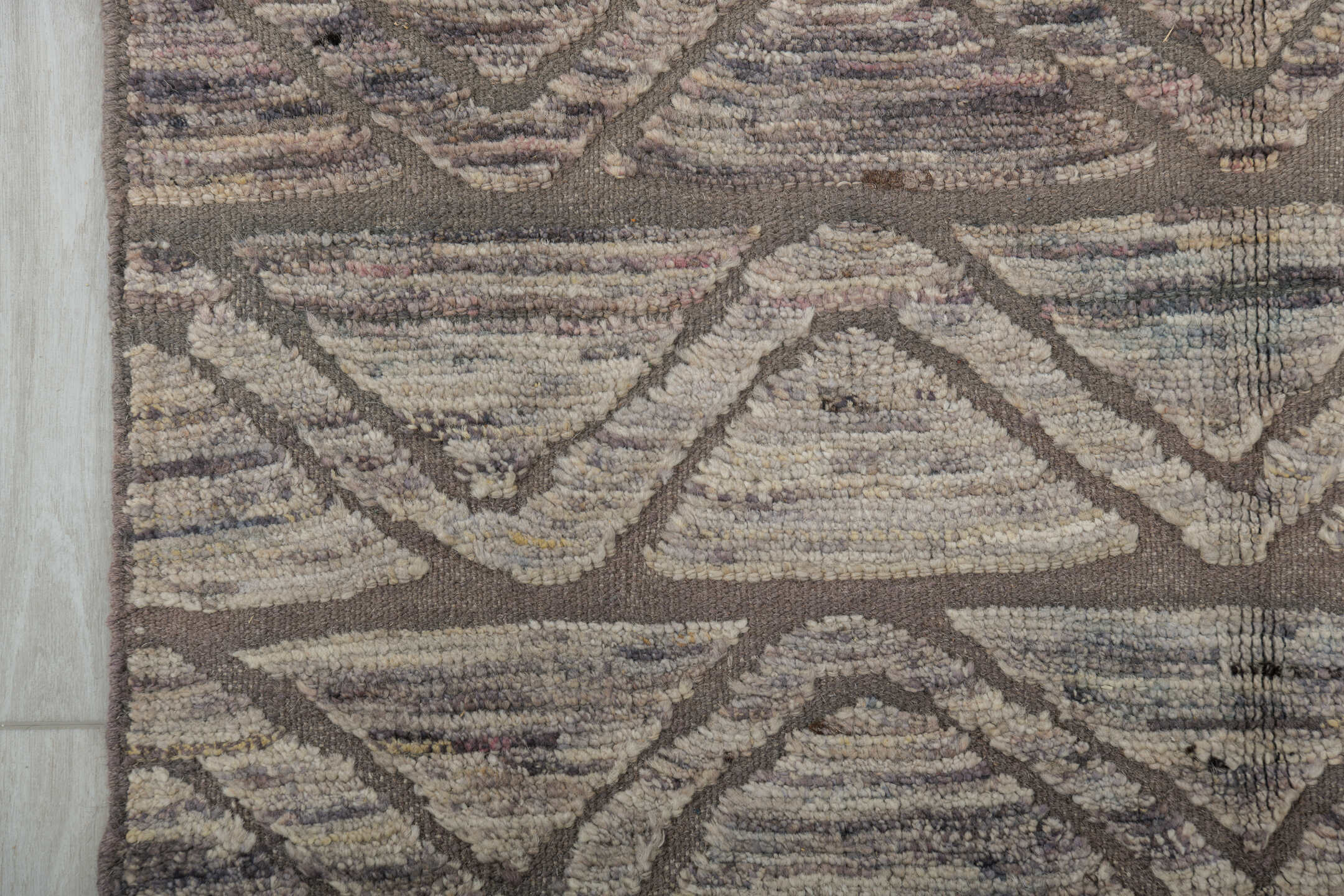 2' x 10' one-of-a-kind handmade vintage Tulu runner rug. Color palette: black, dark gray, gray, light gray, off-white, pink