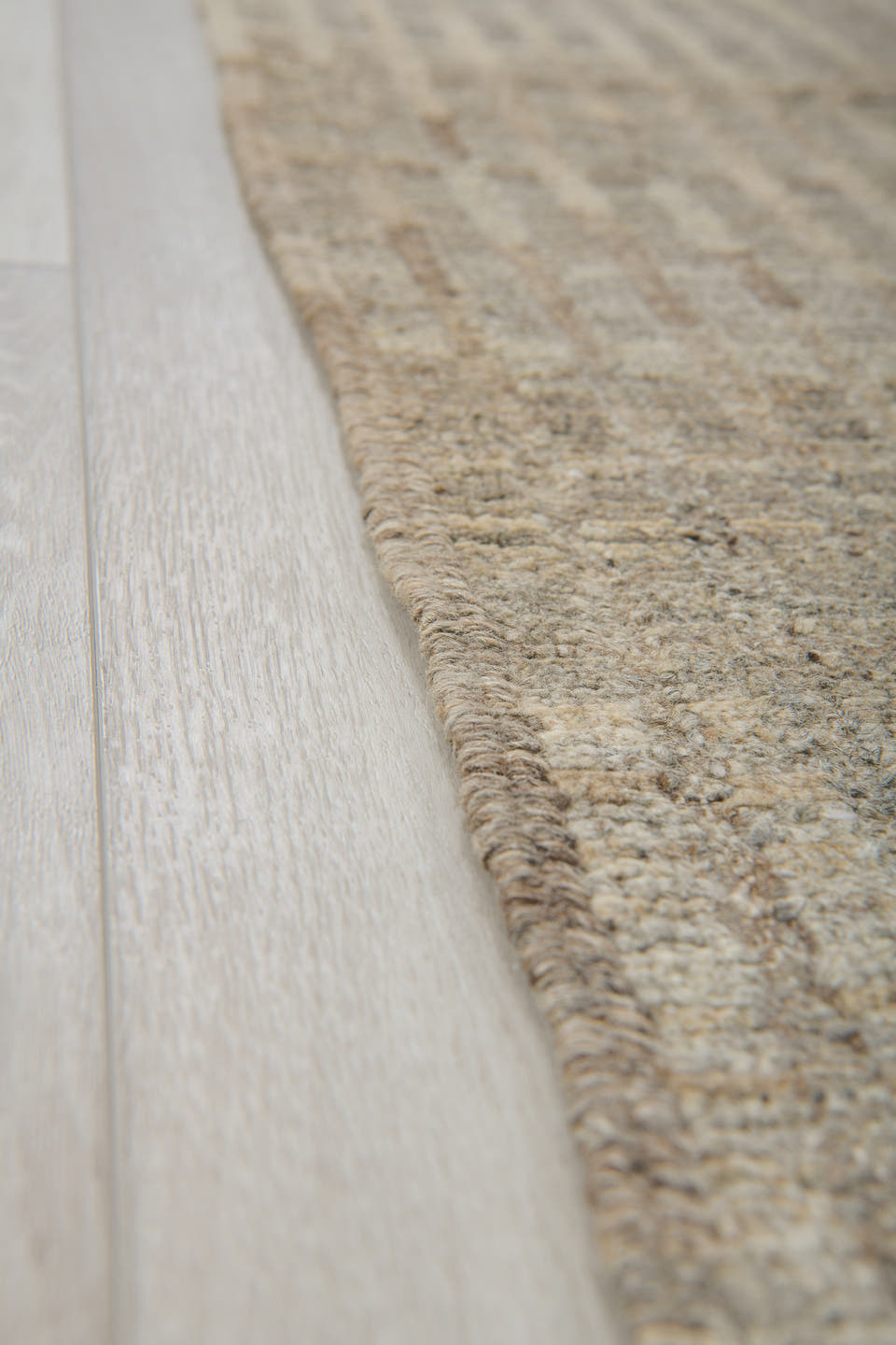 3' x 9' one-of-a-kind handmade vintage Tulu runner rug. Color palette: ivory, taupe, gray, charcoal, beige, black