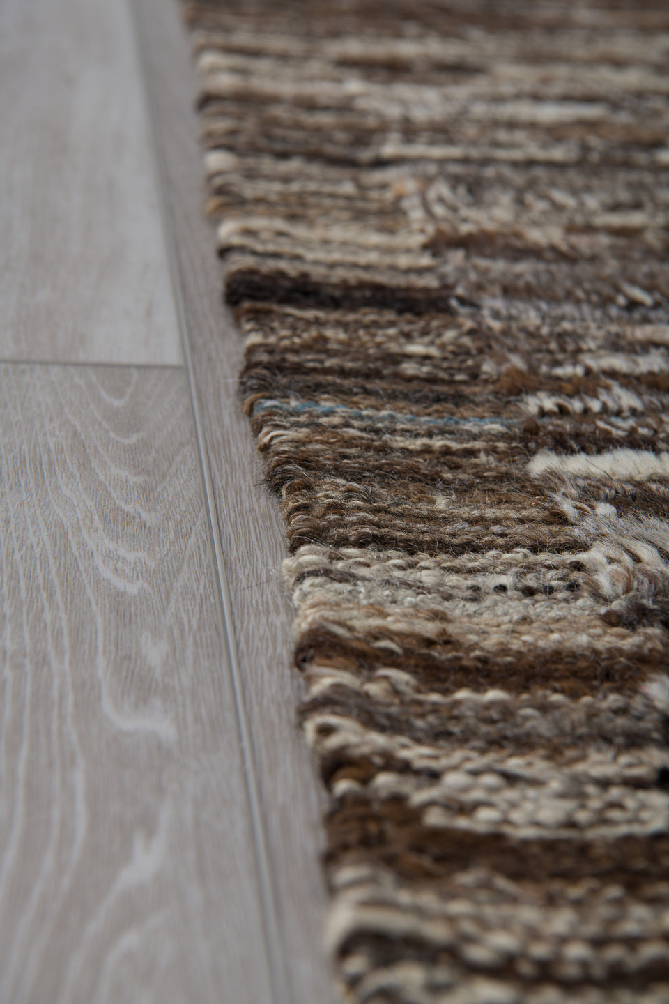 3' x 10' one-of-a-kind handmade vintage Tulu runner rug. Color palette: brown, dark gray, gray, light gray, off-white