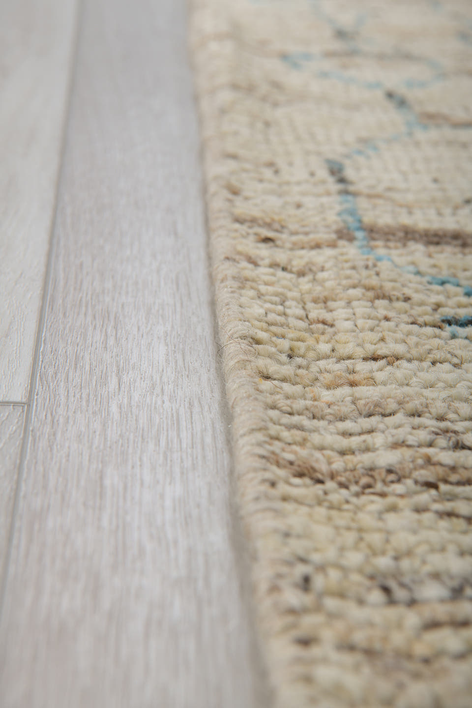 3' x 8' one-of-a-kind handmade vintage Tulu runner rug. Color palette: ivory, sky blue, taupe, brown, cream, light blue