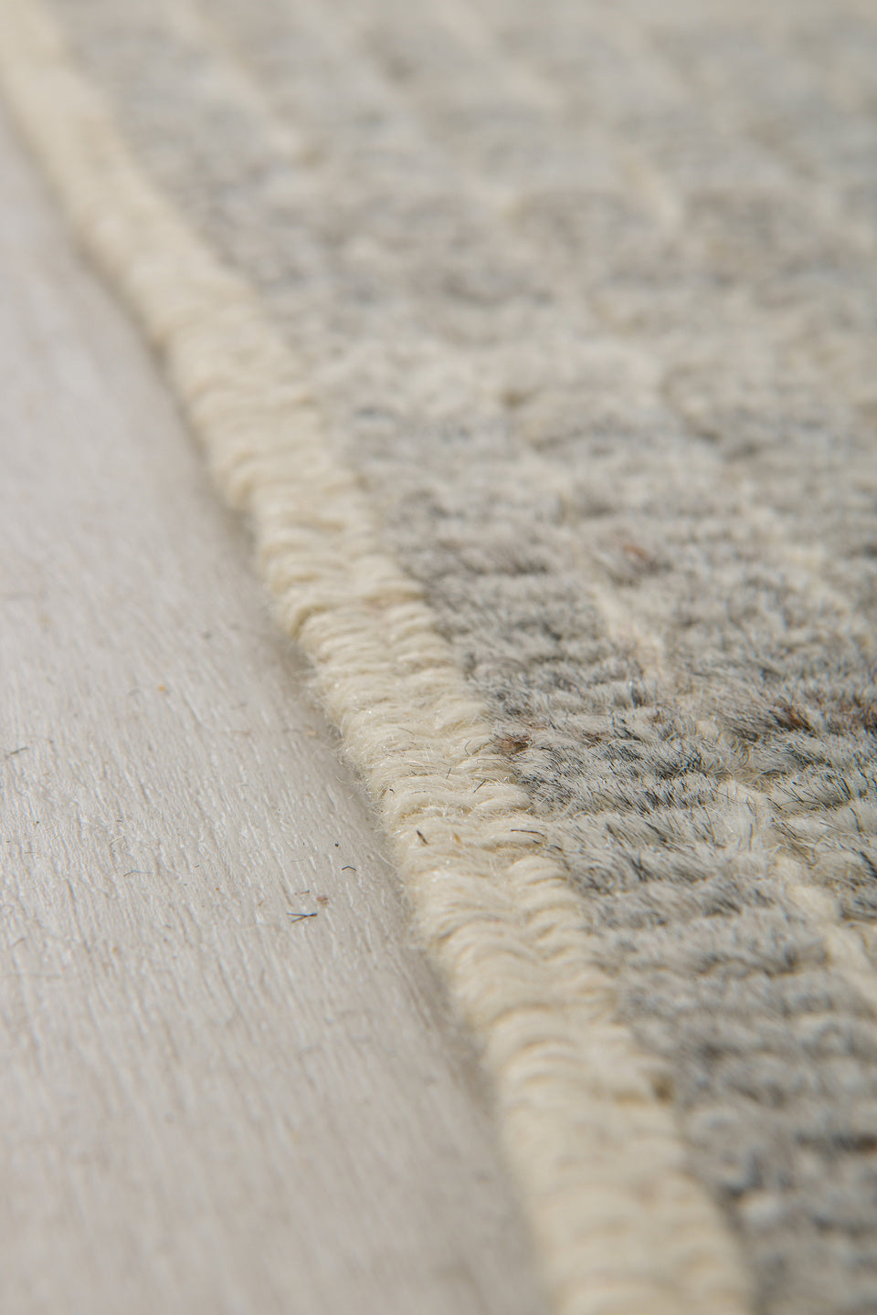 3' x 9' one-of-a-kind handmade vintage Tulu runner rug. Color palette: gray, light gray, off-white, silver