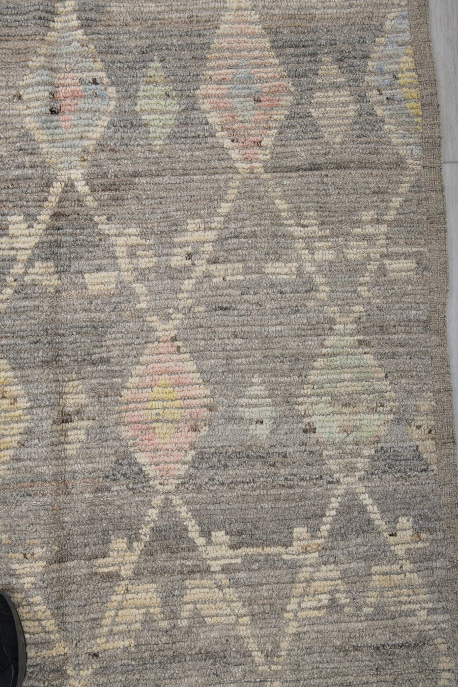 3' x 12' one-of-a-kind handmade vintage Tulu runner rug. Color palette: gray, ivory, cream, pale yellow, blush, sage, gold