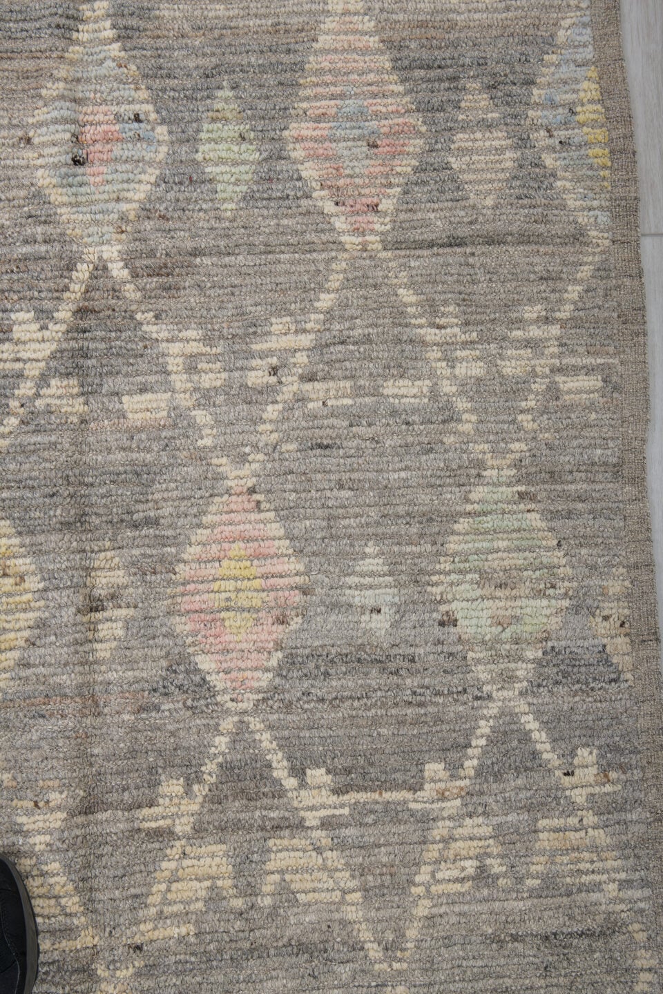 3' x 12' one-of-a-kind handmade vintage Tulu runner rug. Color palette: gray, ivory, cream, pale yellow, blush, sage, gold