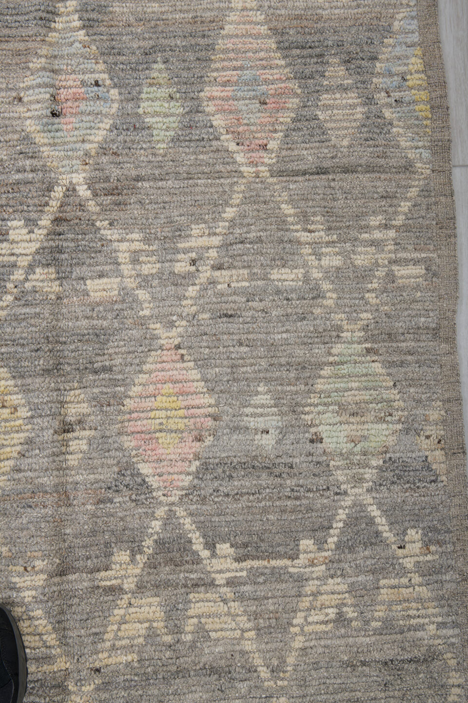 3' x 12' one-of-a-kind handmade vintage Tulu runner rug. Color palette: brown, gray, light gray, off-white, silver
