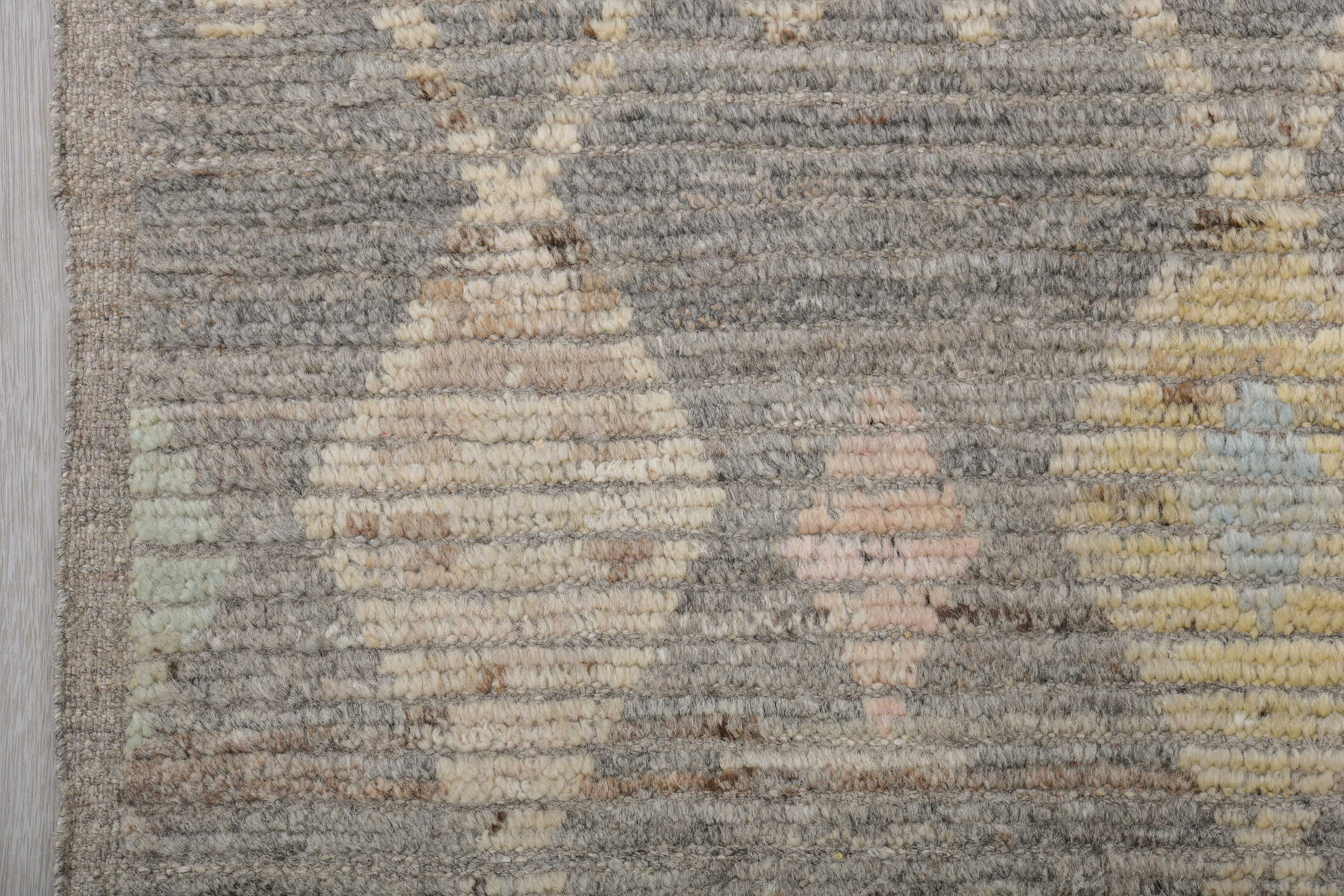 3' x 12' one-of-a-kind handmade vintage Tulu runner rug. Color palette: gray, ivory, cream, pale yellow, blush, sage, gold