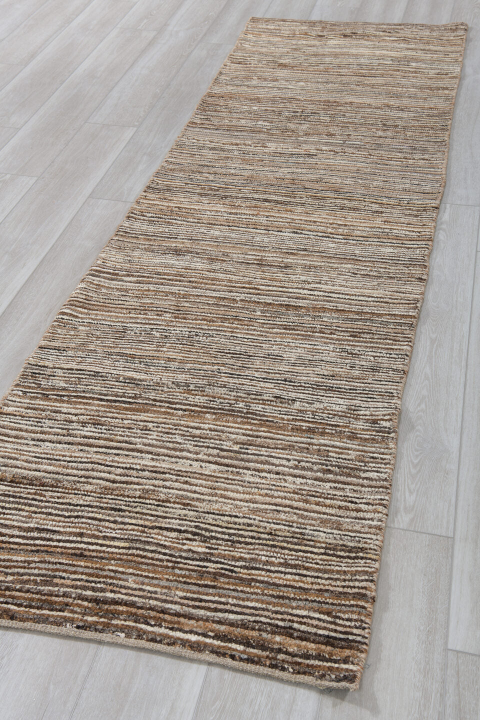 2' x 9' one-of-a-kind handmade vintage Tulu runner rug. Color palette: ivory, brown, taupe, camel, charcoal, beige, gray