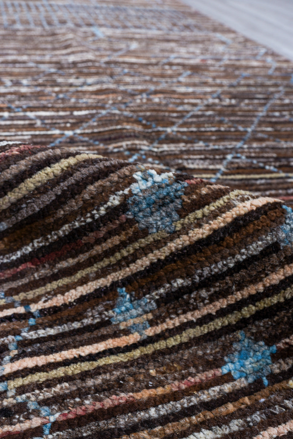 2' x 10' one-of-a-kind handmade vintage Tulu runner rug. Color palette: brown, sky blue, ivory, charcoal, light blue, gray