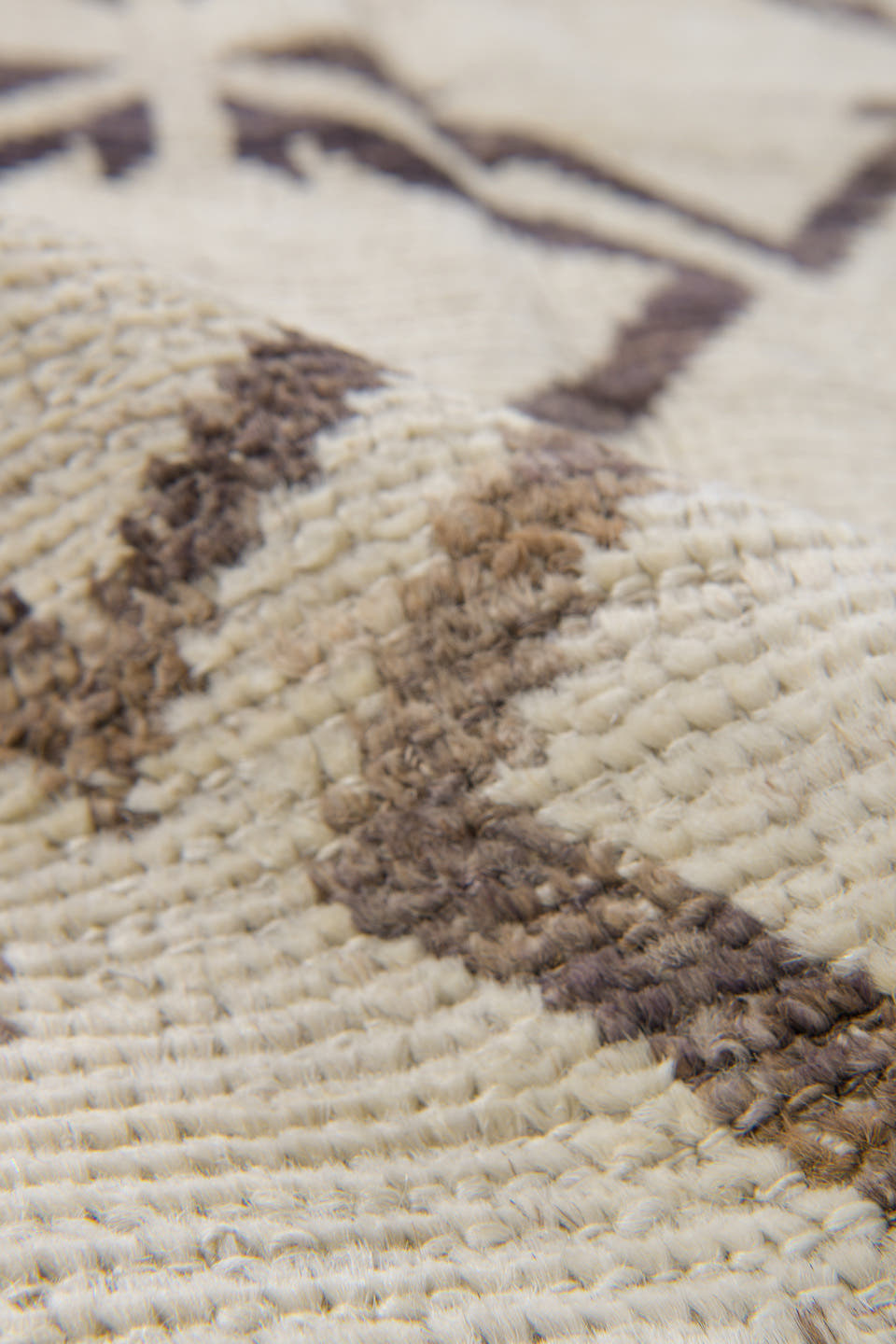 4' x 11' one-of-a-kind handmade vintage Tulu runner rug. Color palette: ivory, charcoal, taupe, black, gray, beige