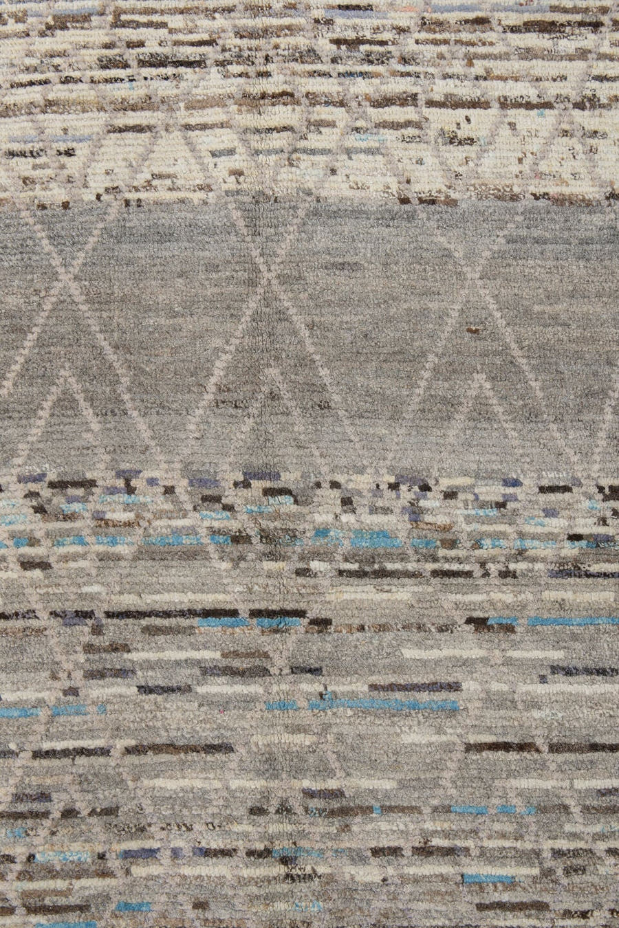 3' x 12' one-of-a-kind handmade vintage Tulu runner rug. Color palette: gray, ivory, taupe, charcoal, sky blue, brown, beige