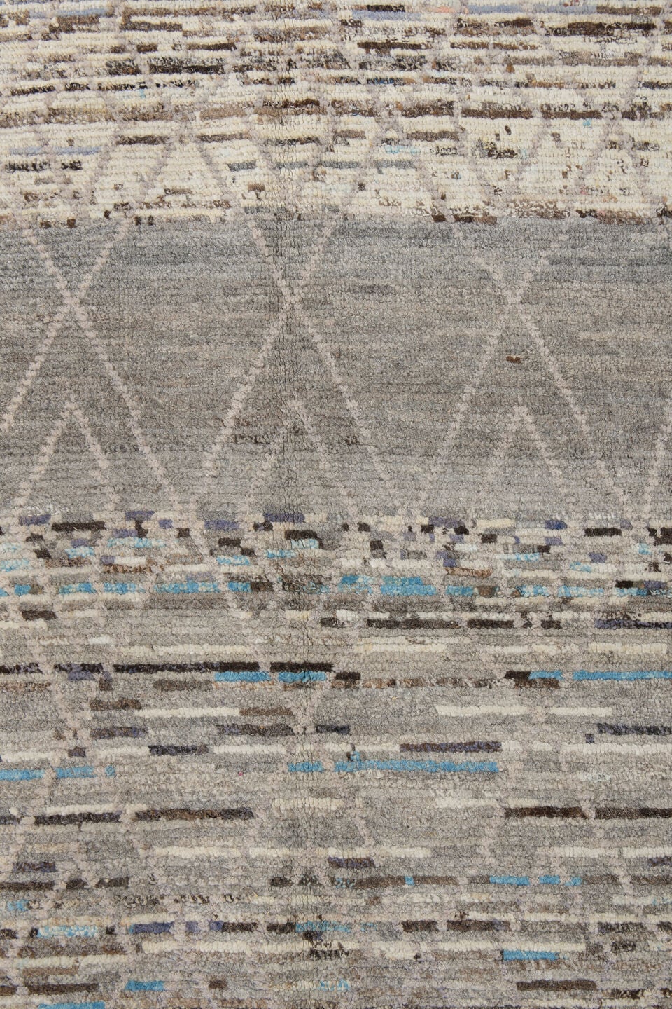 3' x 12' one-of-a-kind handmade vintage Tulu runner rug. Color palette: gray, ivory, taupe, charcoal, sky blue, brown, beige