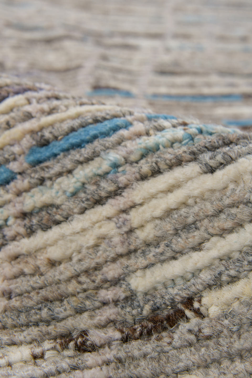 3' x 12' one-of-a-kind handmade vintage Tulu runner rug. Color palette: gray, ivory, taupe, charcoal, sky blue, brown, beige