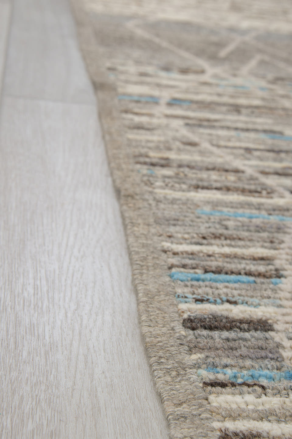 3' x 12' one-of-a-kind handmade vintage Tulu runner rug. Color palette: gray, ivory, taupe, charcoal, sky blue, brown, beige