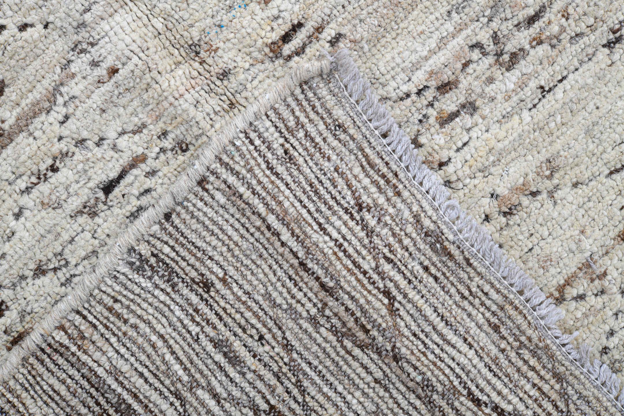 2' x 9' one-of-a-kind handmade vintage Tulu runner rug. Color palette: ivory, taupe, brown, gray, beige
