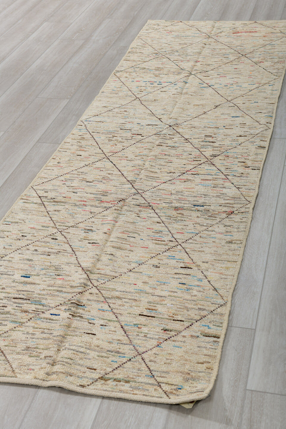 2' x 10' one-of-a-kind handmade vintage Tulu runner rug. Color palette: ivory, taupe, charcoal, camel, slate, sky_blue