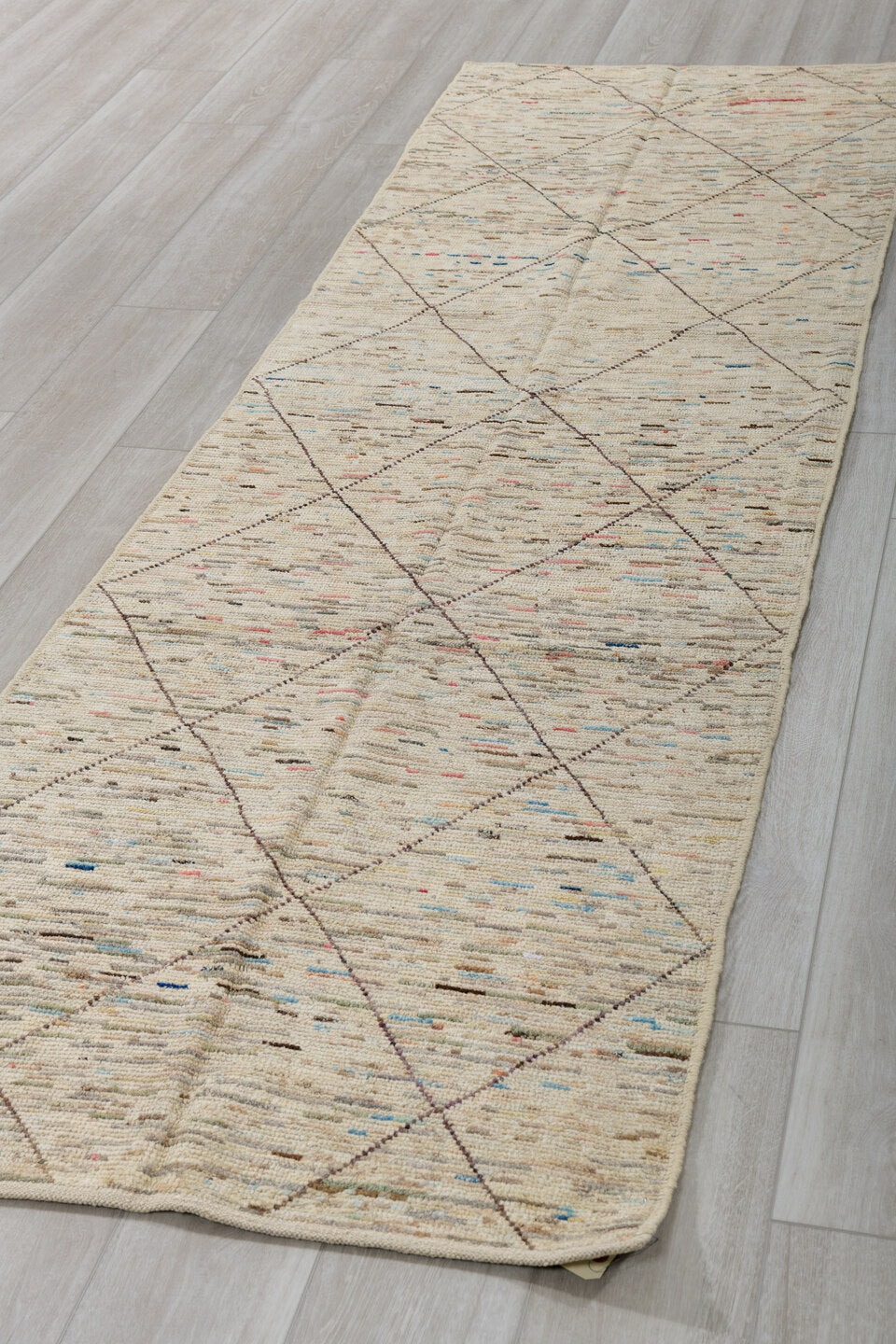 2' x 10' one-of-a-kind handmade vintage Tulu runner rug. Color palette: ivory, taupe, charcoal, camel, slate, sky_blue