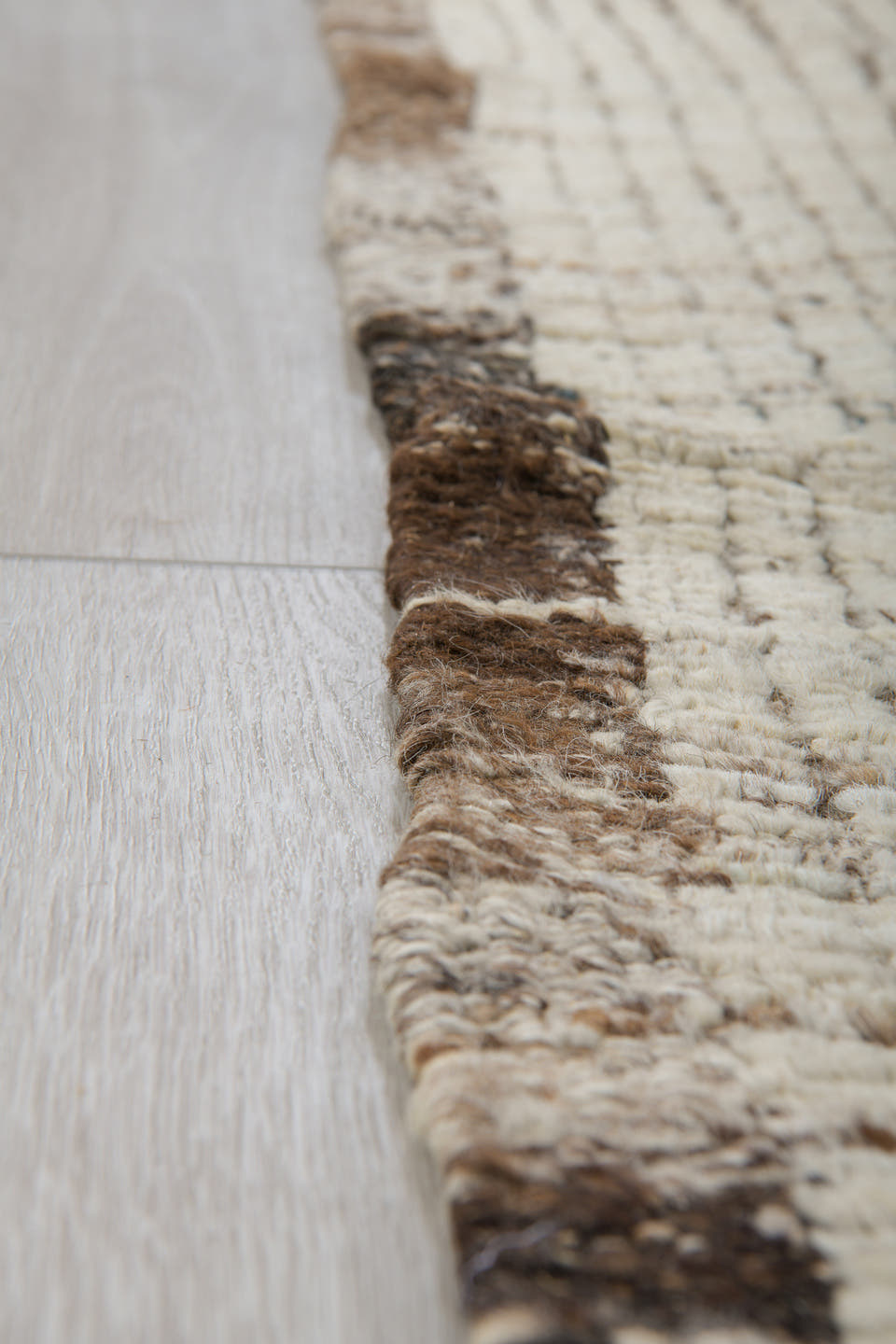 3' x 9' one-of-a-kind handmade vintage Tulu runner rug. Color palette: ivory, brown, taupe, charcoal, beige, gray, black