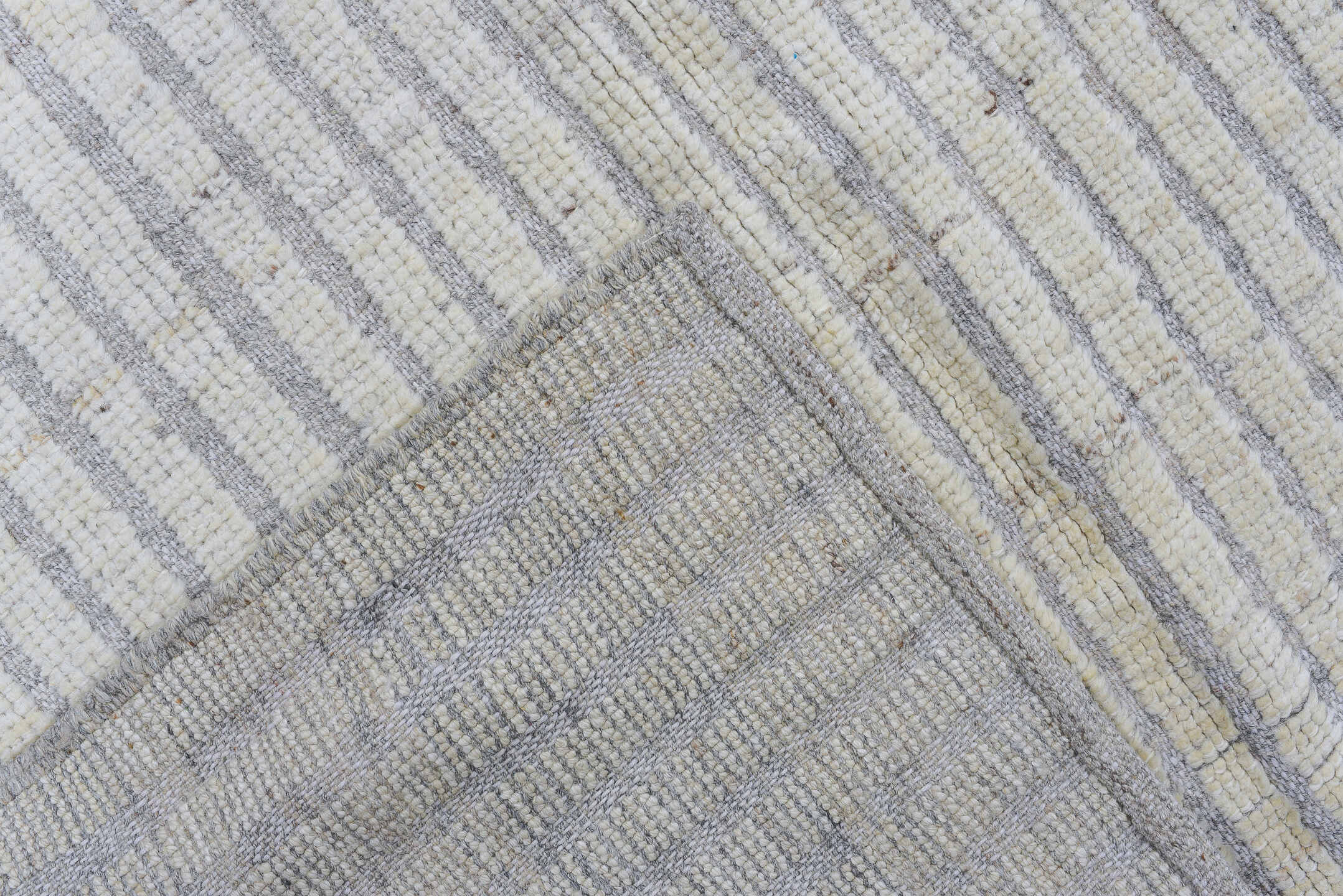 3' x 9' one-of-a-kind handmade vintage Tulu runner rug. Color palette: ivory, pale blue, light gray, light blue
