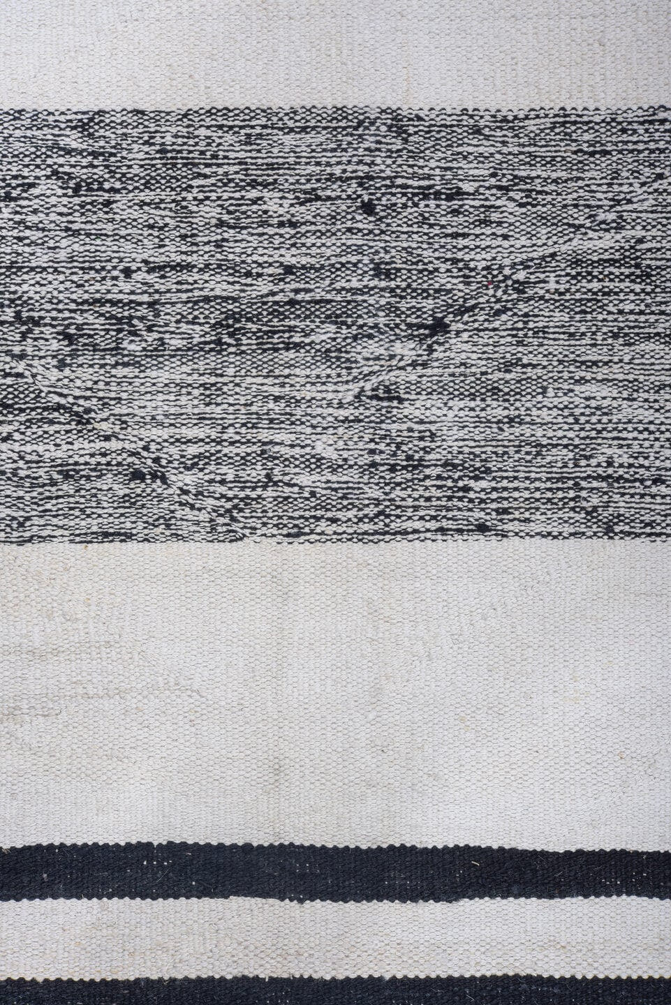 11' x 15' one-of-a-kind handmade vintage Tulu oversize rug. Color palette: ivory, charcoal, black, gray