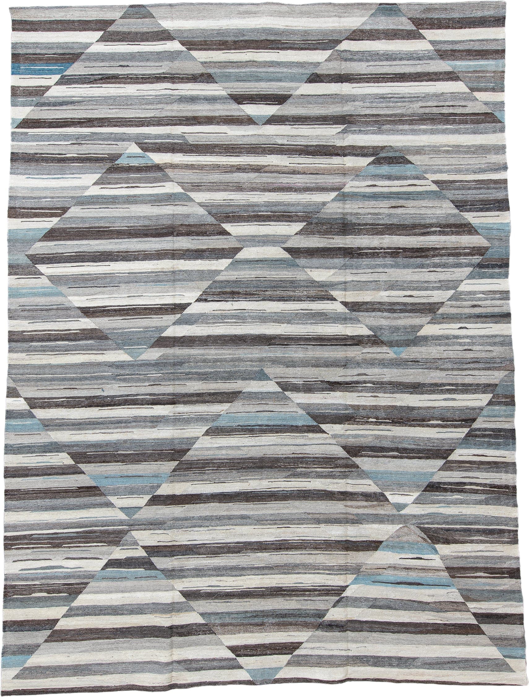 9' x 13' one-of-a-kind handmade vintage Tulu large size rug. Color palette: gray, ivory, charcoal, pale_blue, taupe, black