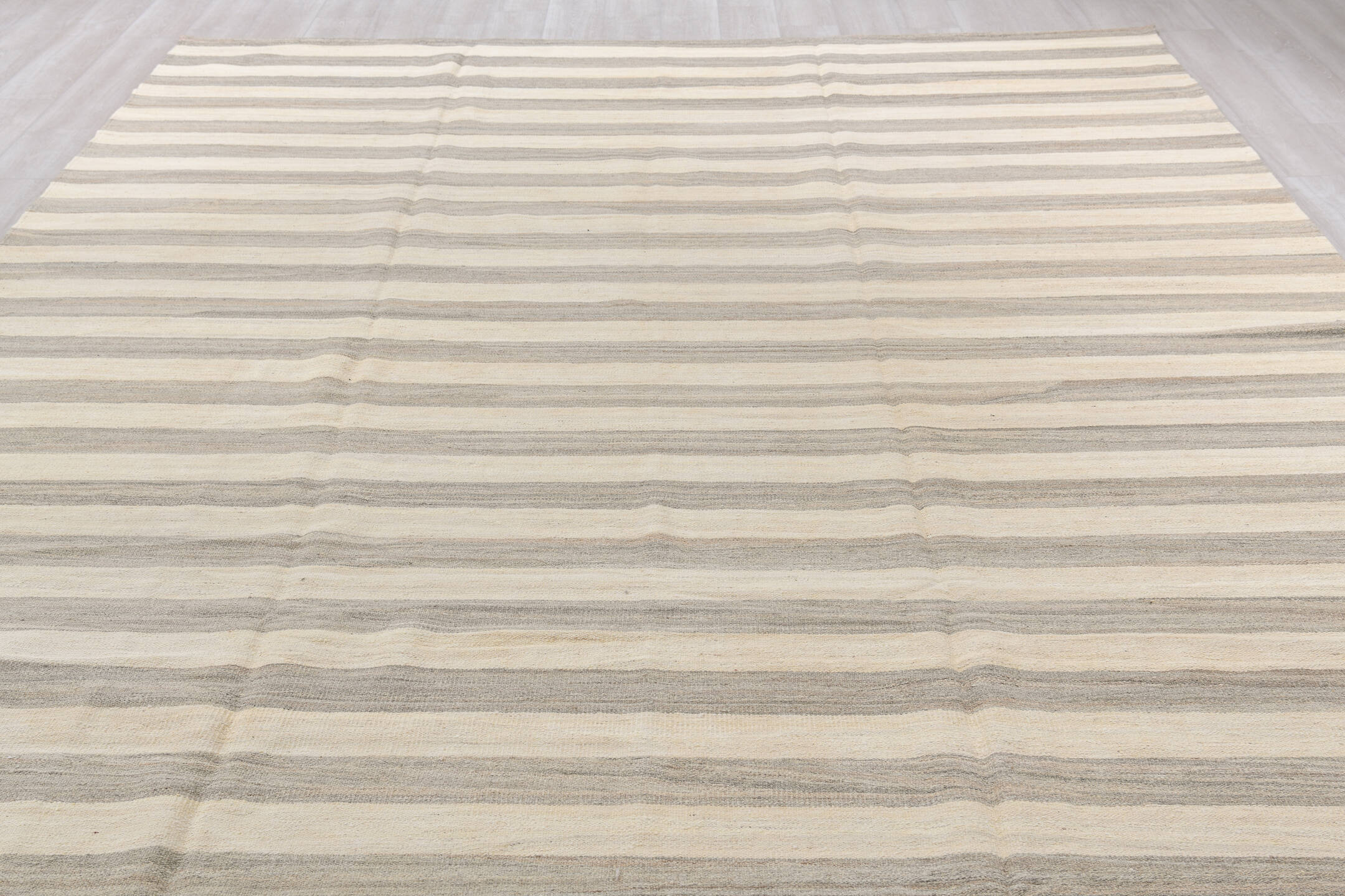 9' x 13' one-of-a-kind handmade vintage Kilim large size rug. Color palette: brown, gray, light gray, linen, off-white