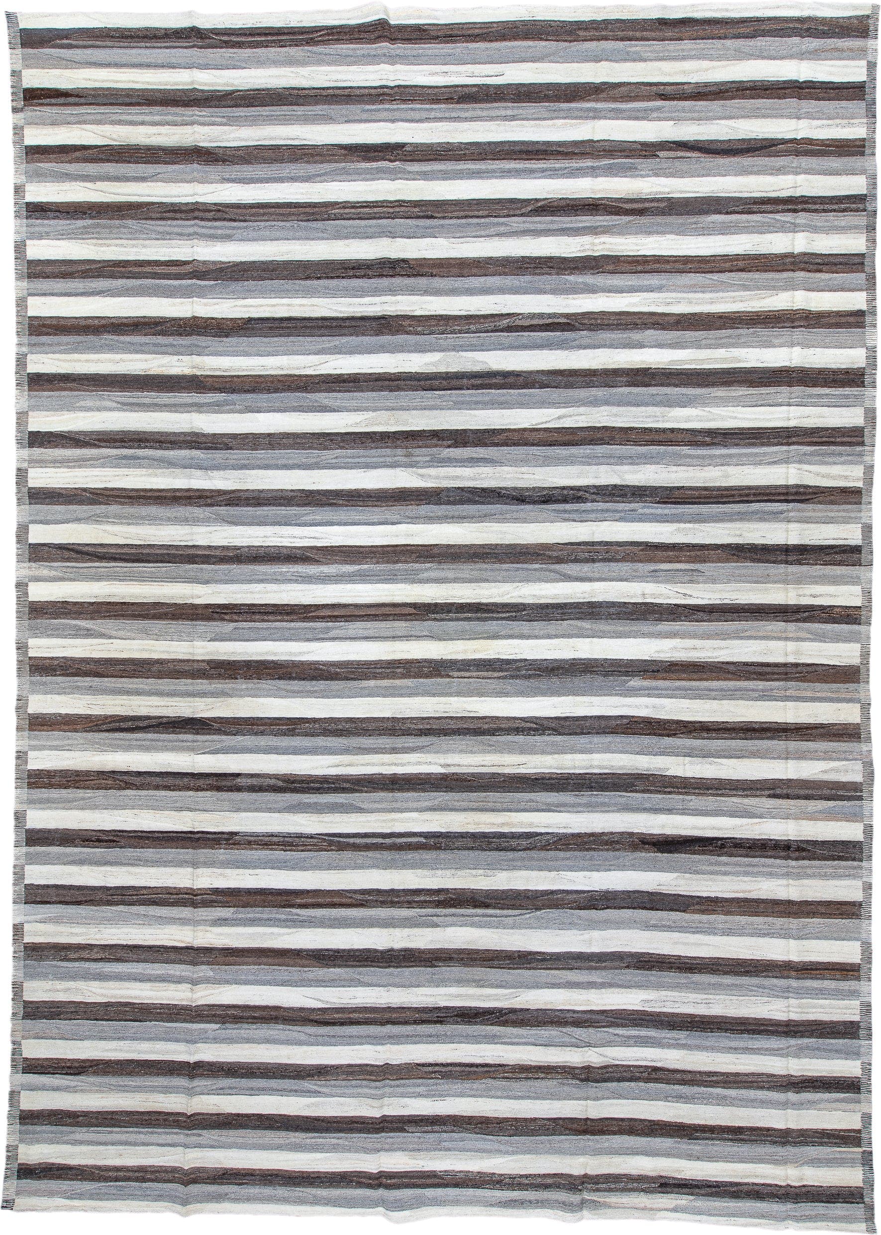 14' x 20' one-of-a-kind handmade vintage Tulu oversize rug. Color palette: ivory, taupe, brown, gray, charcoal, beige, black