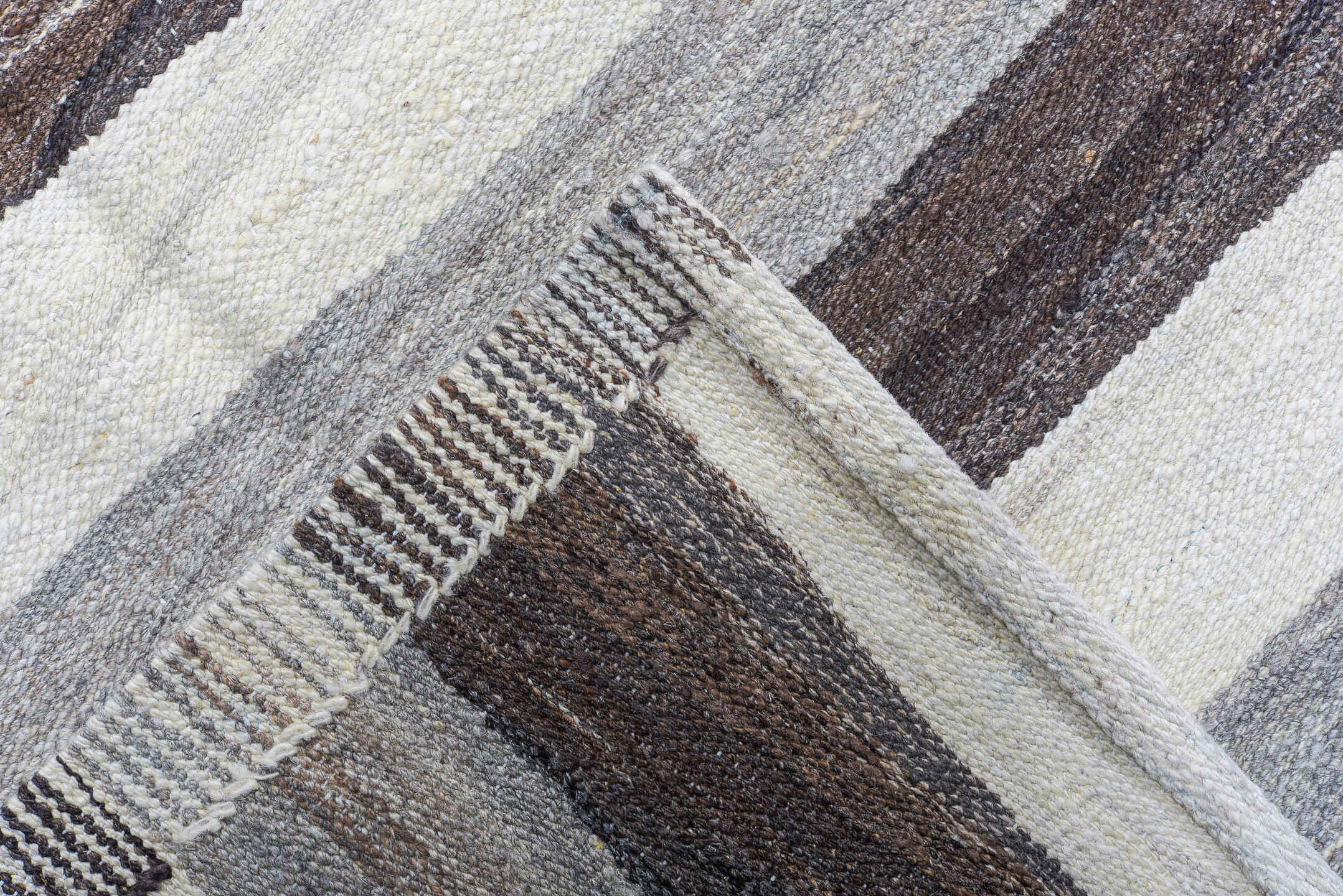 14' x 20' one-of-a-kind handmade vintage Tulu oversize rug. Color palette: ivory, taupe, brown, gray, charcoal, beige, black