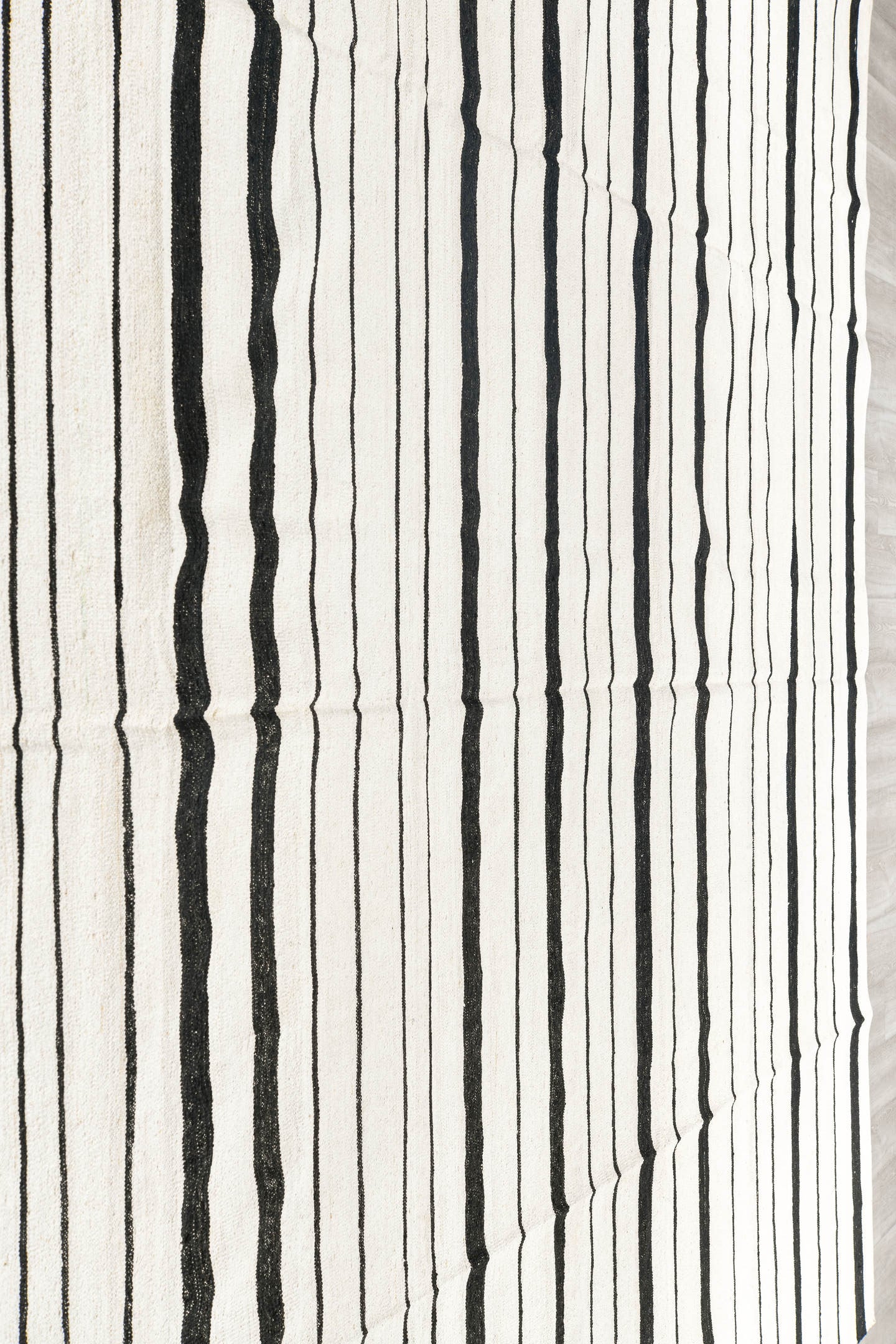 14' x 18' one-of-a-kind handmade vintage Tulu oversize rug. Color palette: ivory, charcoal, gray, black