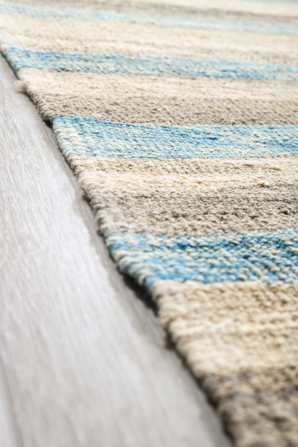14' x 19' one-of-a-kind handmade vintage Tulu oversize rug. Color palette: ivory, pale blue, taupe, cream, gray, light blue