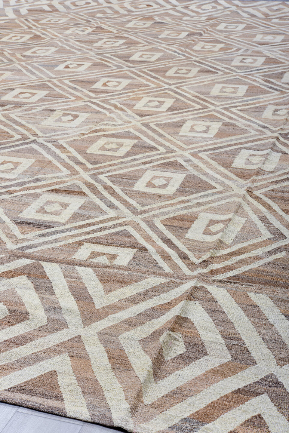 14' x 19' one-of-a-kind handmade vintage Kilim oversize rug. Color palette: taupe, ivory, beige, camel, greige, gray