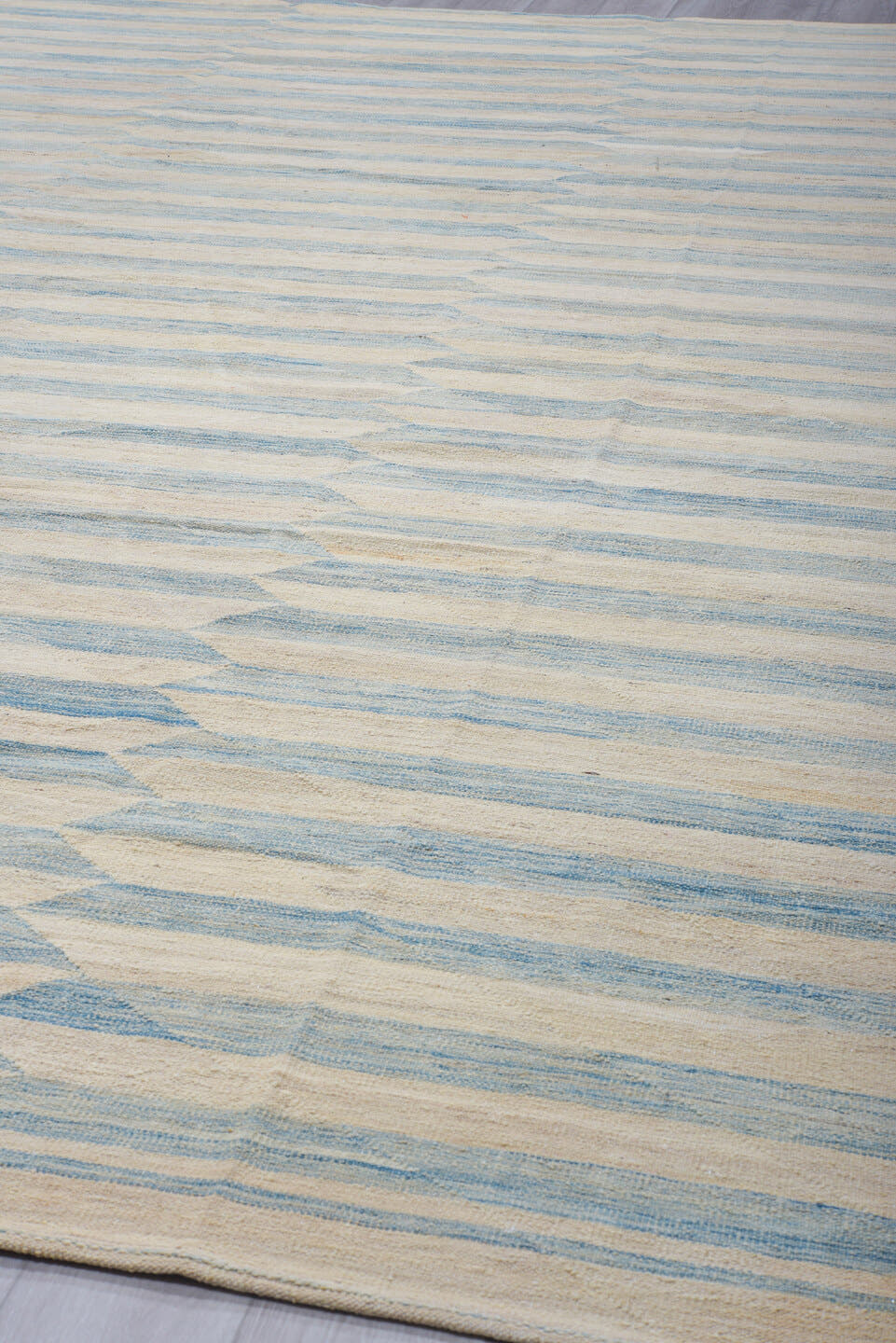 12' x 14' one-of-a-kind handmade vintage Kilim oversize rug. Color palette: ivory, pale blue, cream, sky blue, beige