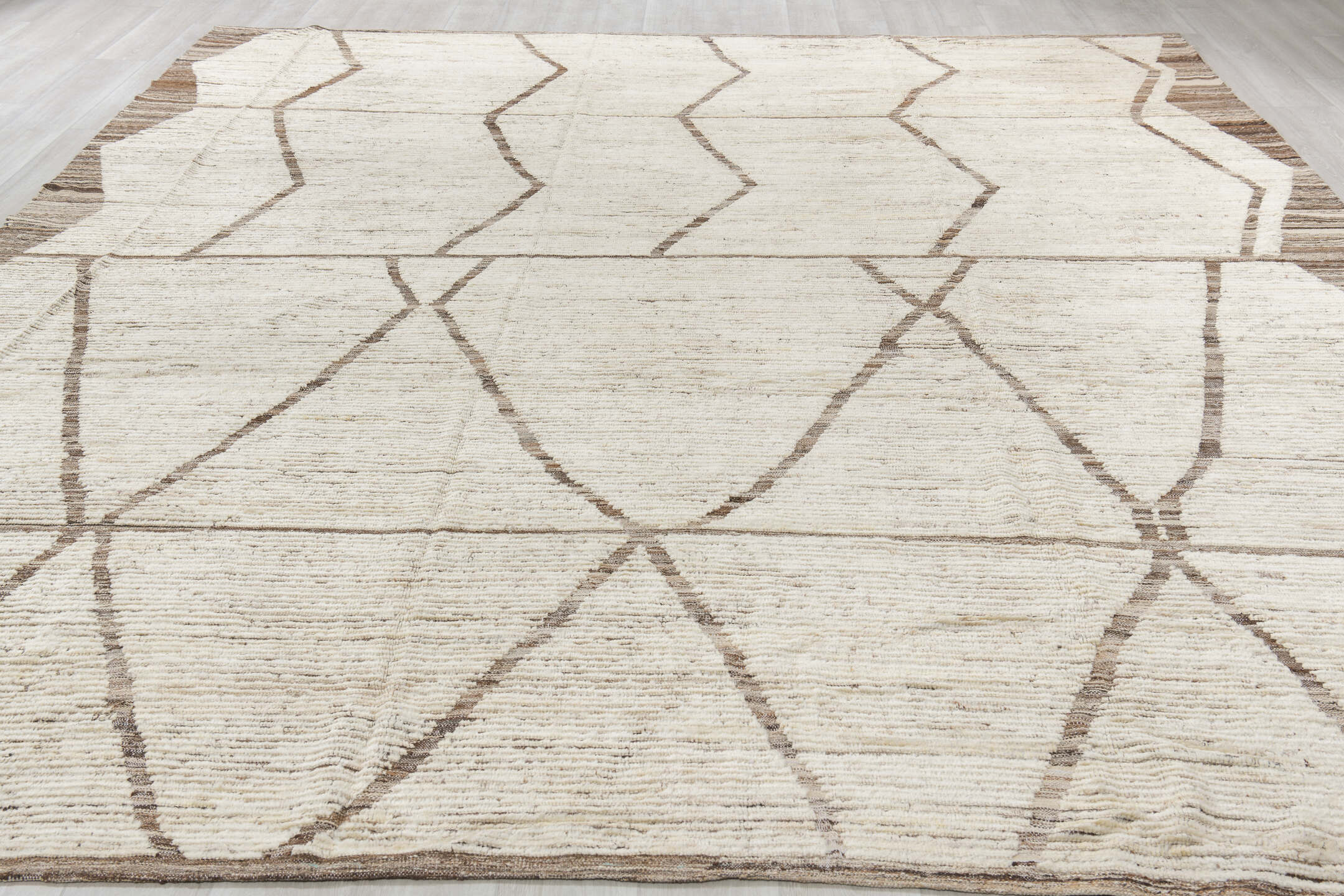 11' x 13' one-of-a-kind handmade vintage Tulu oversize rug. Color palette: dark gray, gray, light gray, linen, off-white