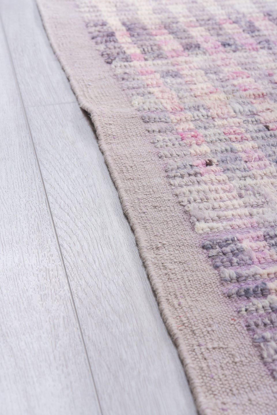 10' x 13' one-of-a-kind handmade vintage Tulu large size rug. Color palette: lavender, ivory, gray, pink, charcoal, yellow