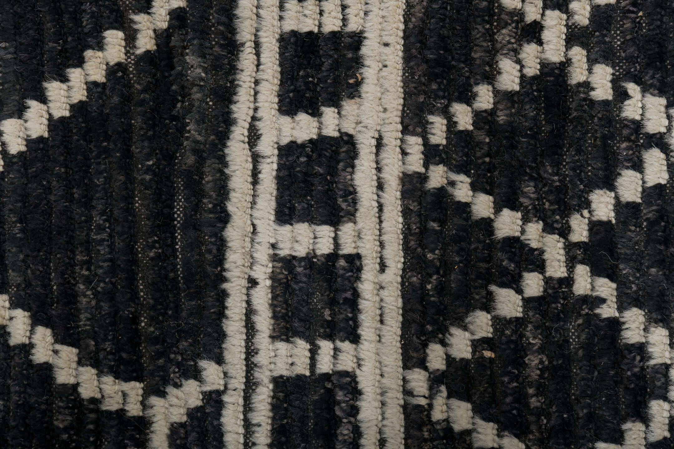 9' x 12' one-of-a-kind handmade vintage Tulu large size rug. Color palette: charcoal, ivory, slate, ebony, gray, black