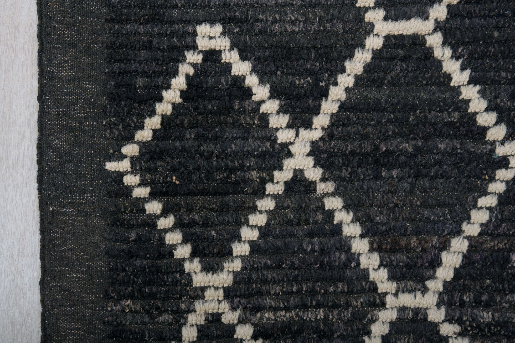 9' x 12' one-of-a-kind handmade vintage Tulu large size rug. Color palette: charcoal, ivory, slate, ebony, gray, black