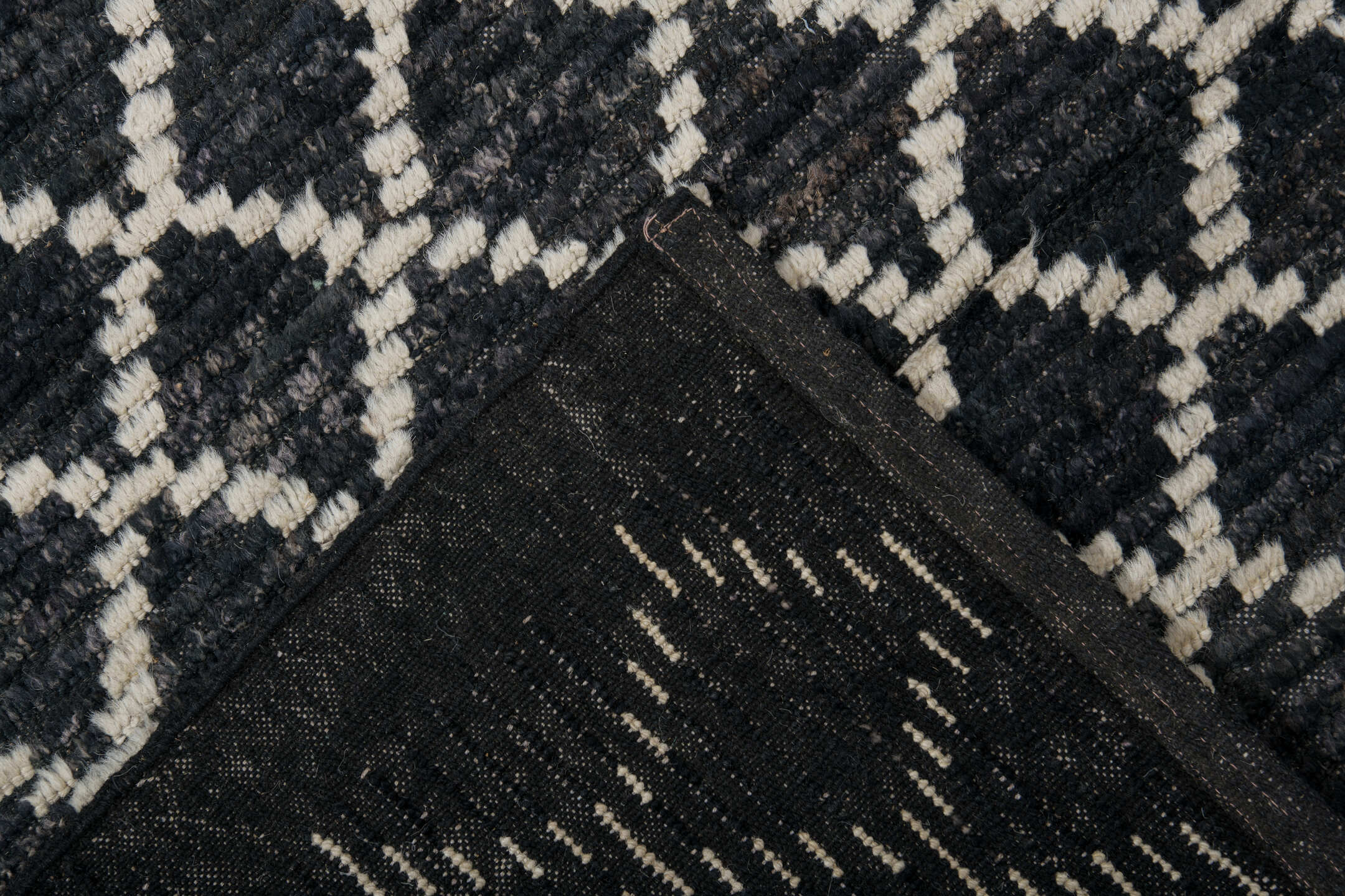 9' x 12' one-of-a-kind handmade vintage Tulu large size rug. Color palette: charcoal, ivory, slate, ebony, gray, black