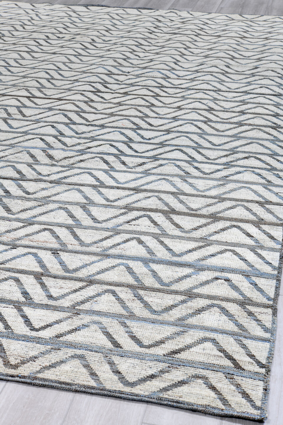 9' x 13' one-of-a-kind handmade vintage Tulu large size rug. Color palette: ivory, slate, blue, charcoal, gray, black