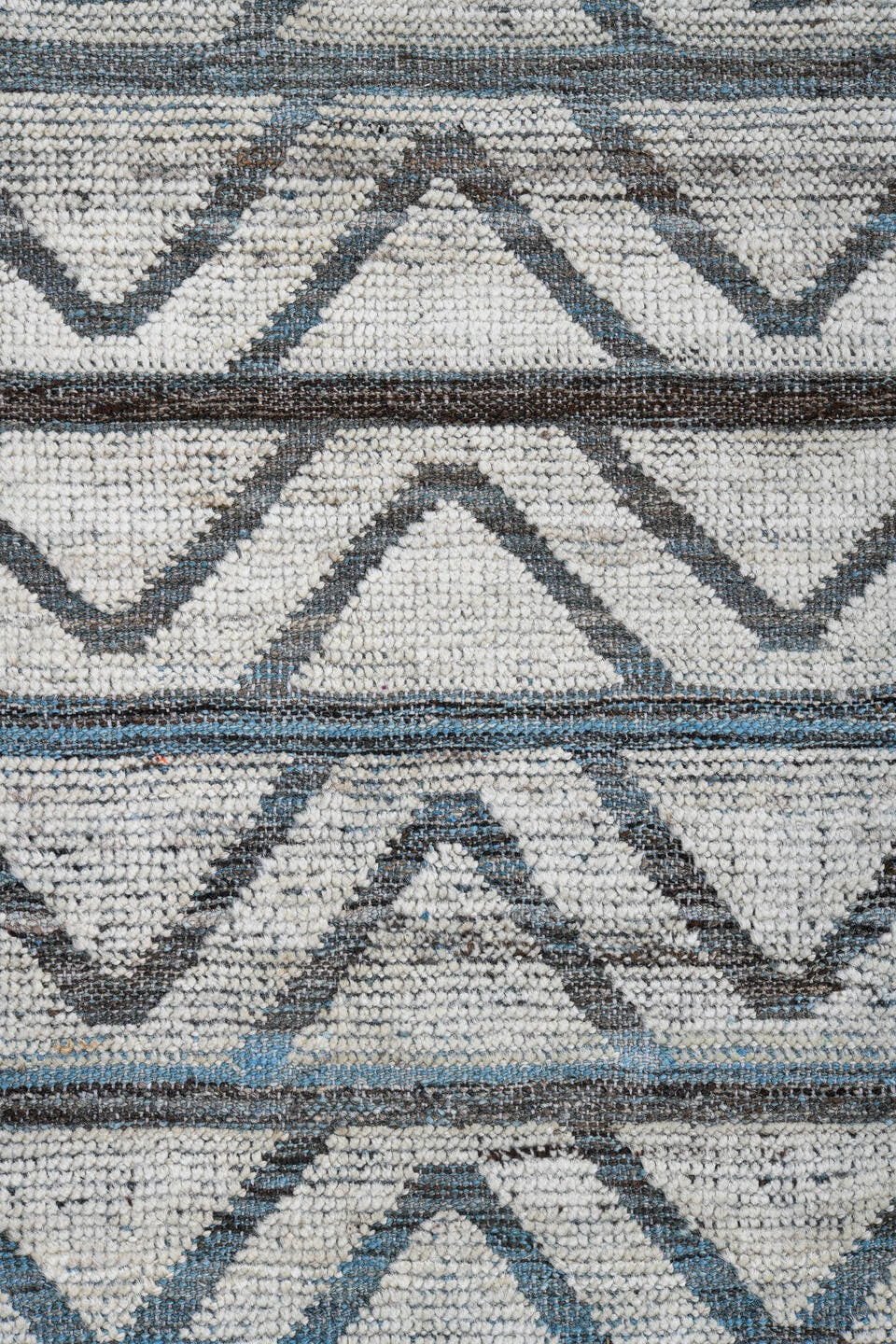9' x 13' one-of-a-kind handmade vintage Tulu large size rug. Color palette: ivory, slate, blue, charcoal, gray, black